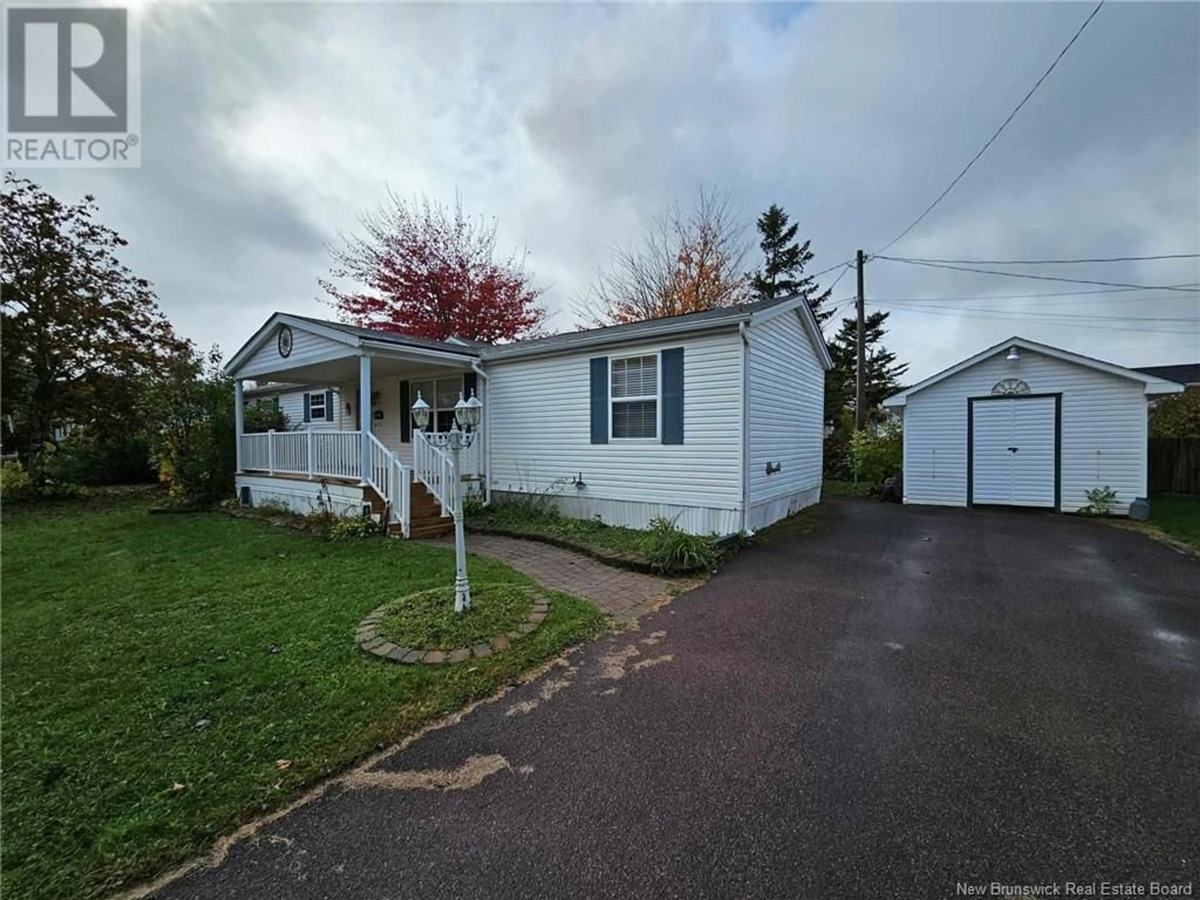 Home with vinyl exterior material, street for 30 BLUE JAY STREET, Moncton New Brunswick E1H2S2