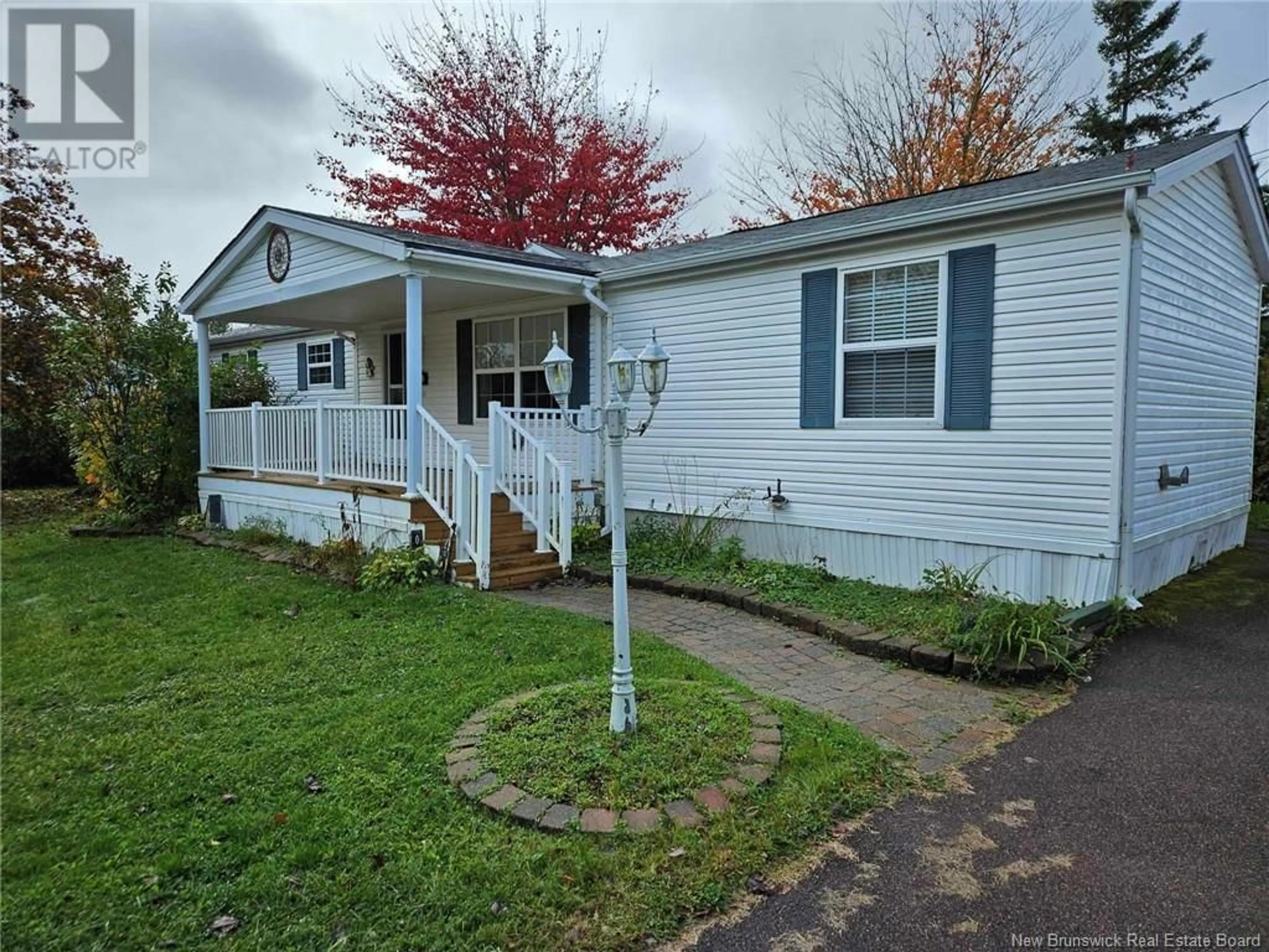 Home with vinyl exterior material, street for 30 BLUE JAY STREET, Moncton New Brunswick E1H2S2