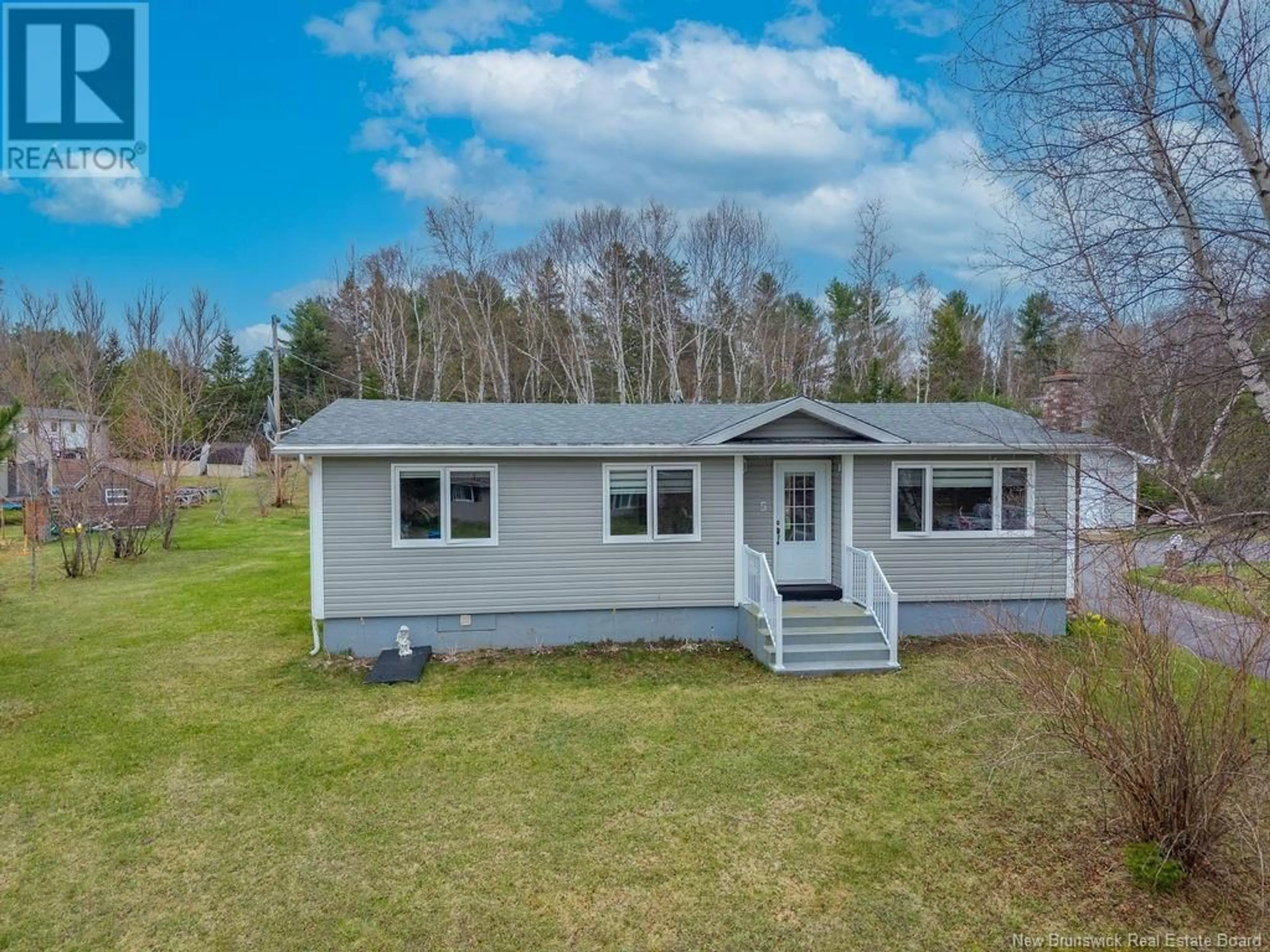 A pic from outside/outdoor area/front of a property/back of a property/a pic from drone, water/lake/river/ocean view for 5 RIVERVIEW AVENUE, Miramichi New Brunswick E1N3K1