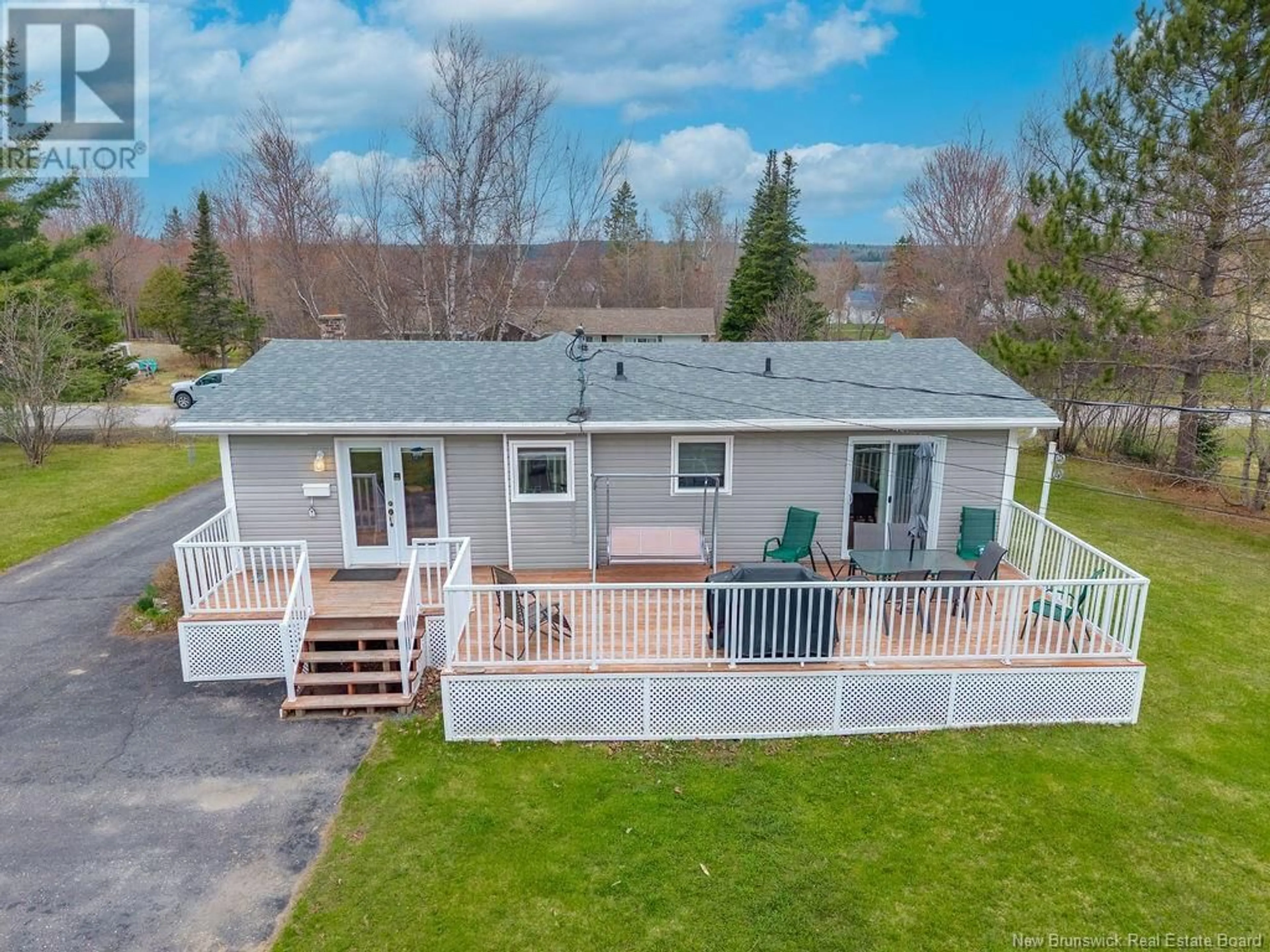 A pic from outside/outdoor area/front of a property/back of a property/a pic from drone, water/lake/river/ocean view for 5 RIVERVIEW AVENUE, Miramichi New Brunswick E1N3K1