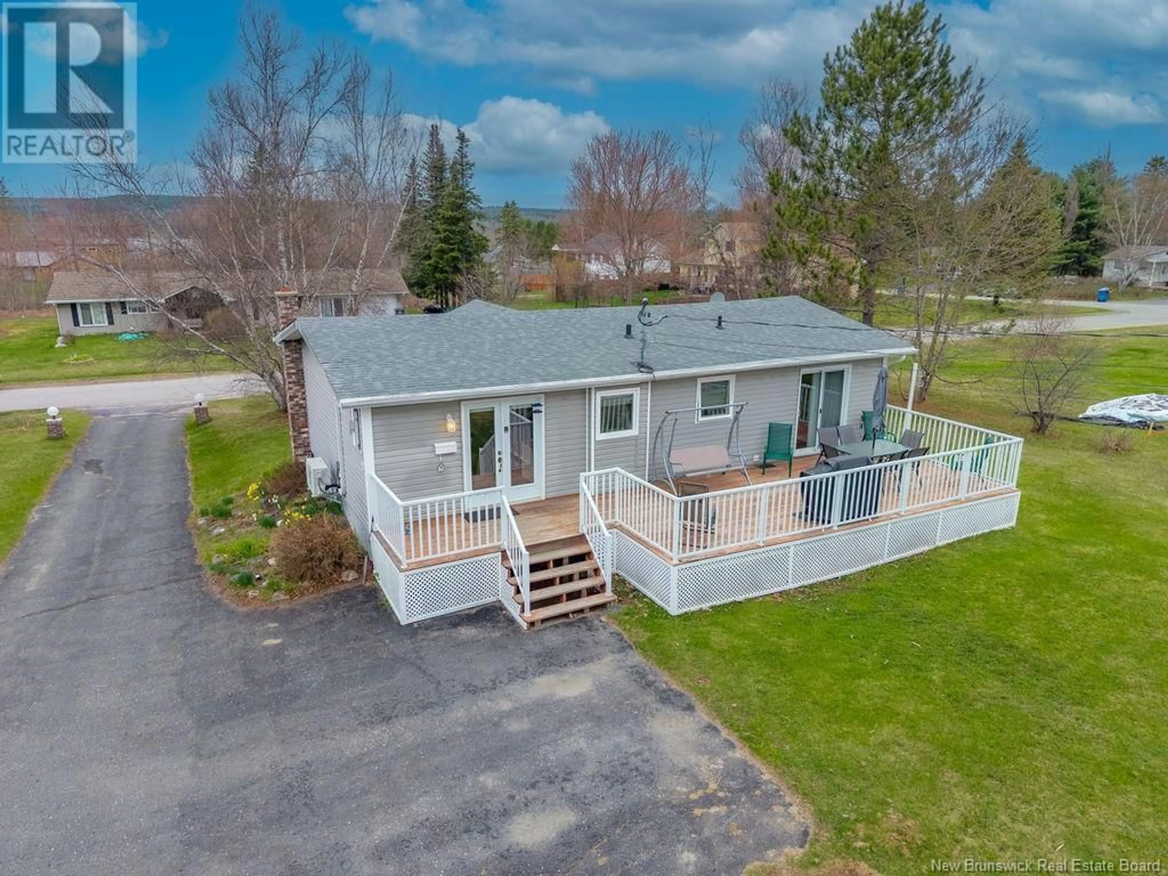 A pic from outside/outdoor area/front of a property/back of a property/a pic from drone, water/lake/river/ocean view for 5 RIVERVIEW AVENUE, Miramichi New Brunswick E1N3K1