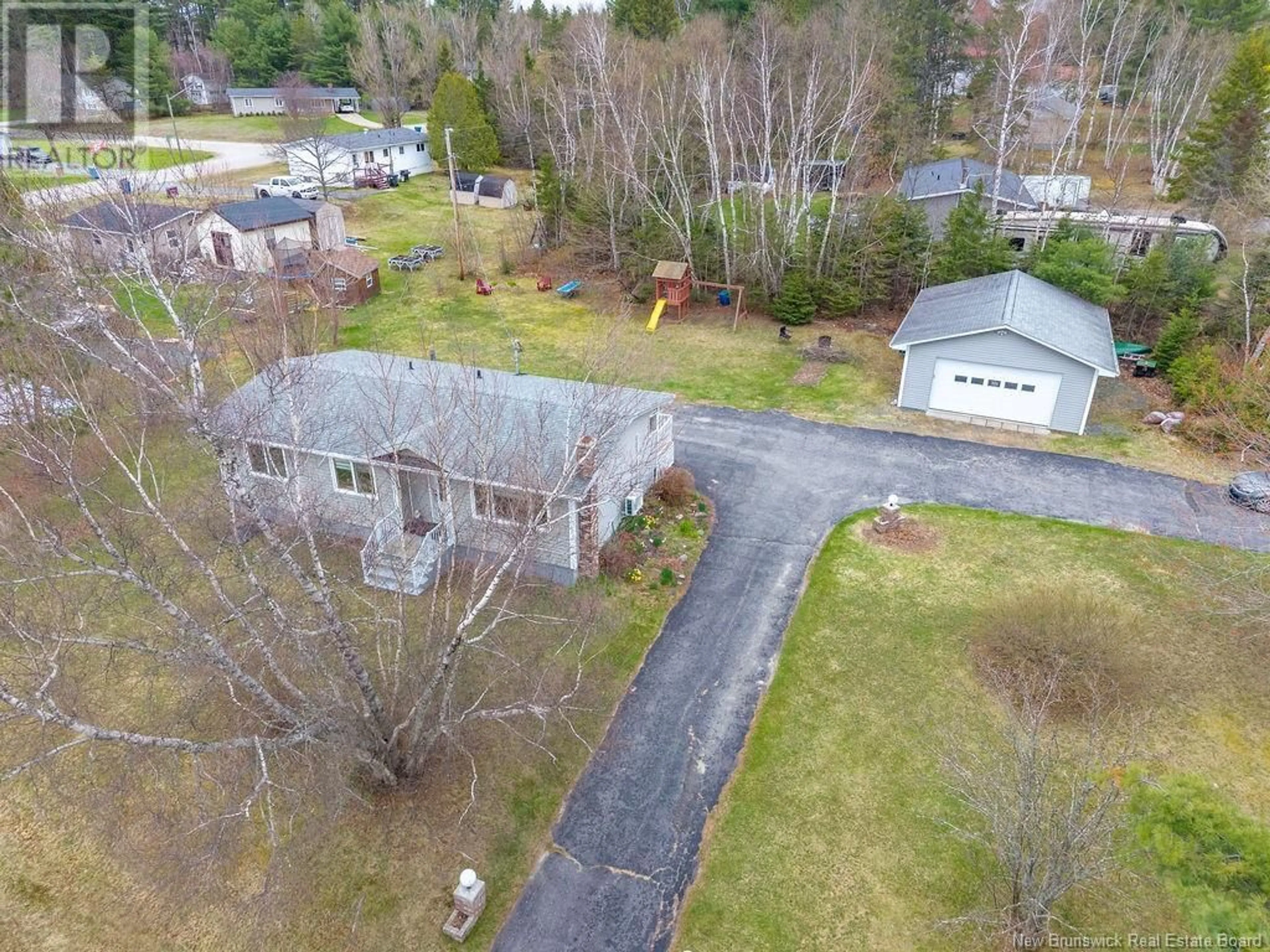 A pic from outside/outdoor area/front of a property/back of a property/a pic from drone, street for 5 RIVERVIEW AVENUE, Miramichi New Brunswick E1N3K1