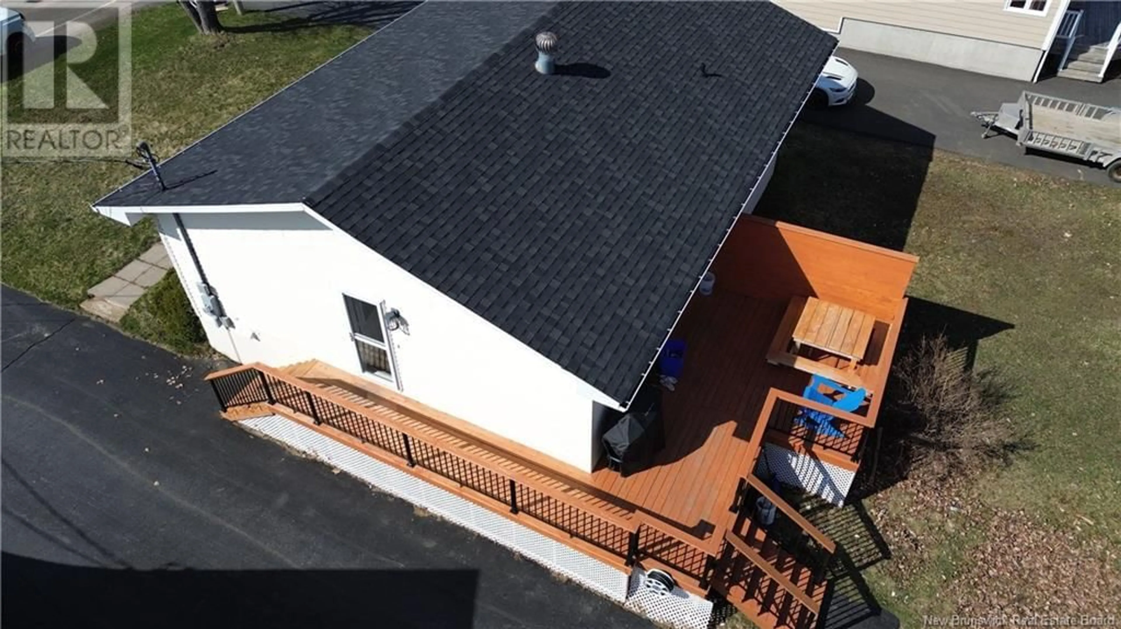A pic from outside/outdoor area/front of a property/back of a property/a pic from drone, building for 234 LANDRY STREET, Beresford New Brunswick E8K1H1