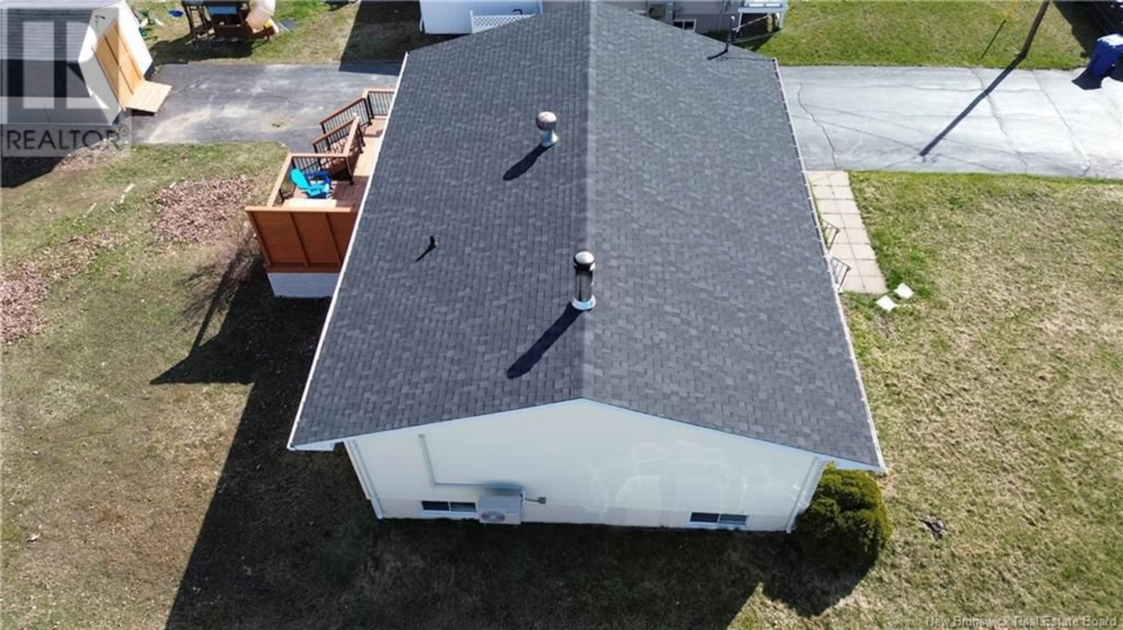 A pic from outside/outdoor area/front of a property/back of a property/a pic from drone, building for 234 LANDRY STREET, Beresford New Brunswick E8K1H1