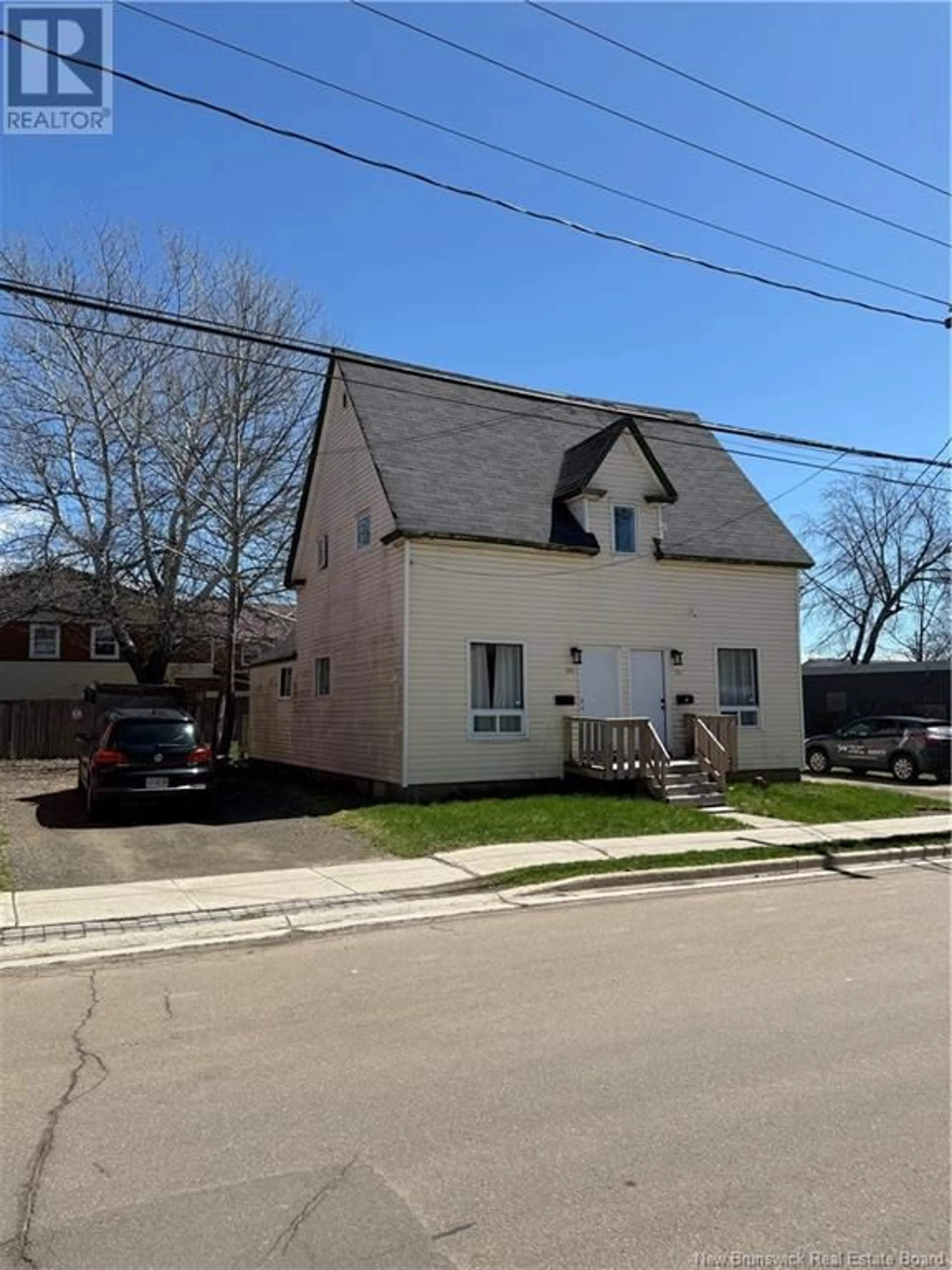 Home with vinyl exterior material, street for 131-133 DOMINION STREET, Moncton New Brunswick E1C6G8