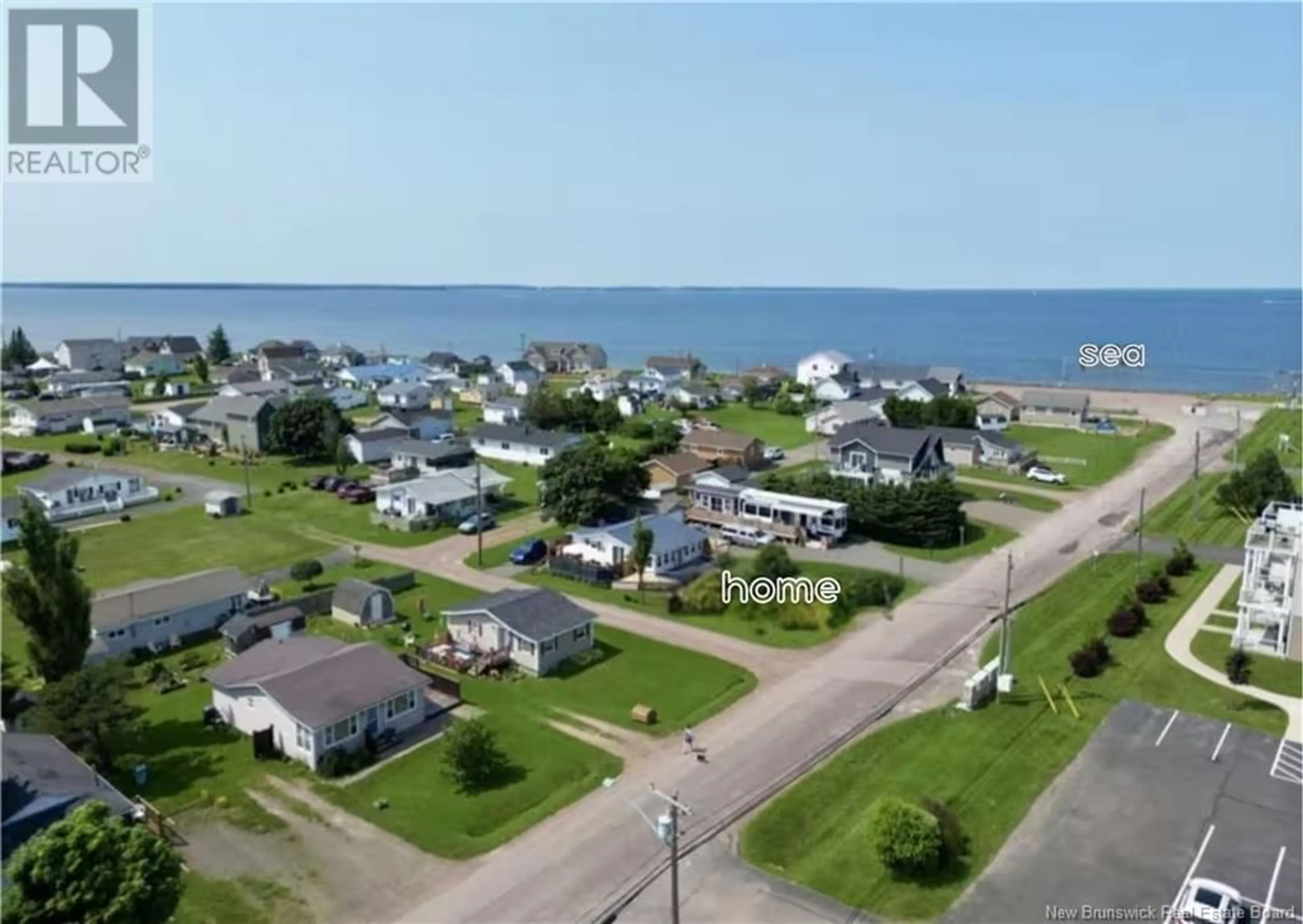 A pic from outside/outdoor area/front of a property/back of a property/a pic from drone, water/lake/river/ocean view for 72 CAP BIMET BOULEVARD, Grand-Barachois New Brunswick E4P6Y1