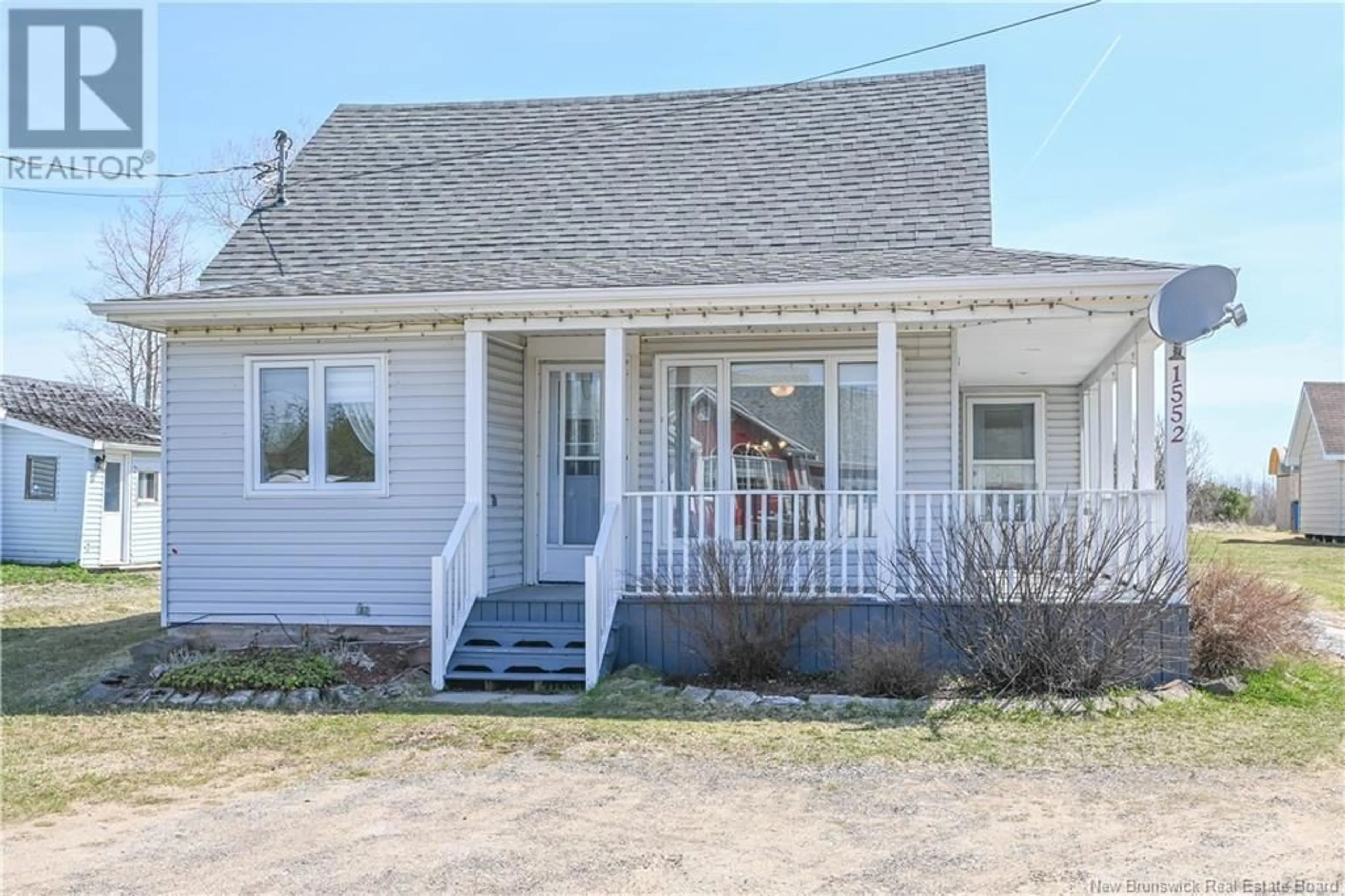 Home with vinyl exterior material, street for 1552 135 ROUTE, Bois-Blanc New Brunswick E8R2B2