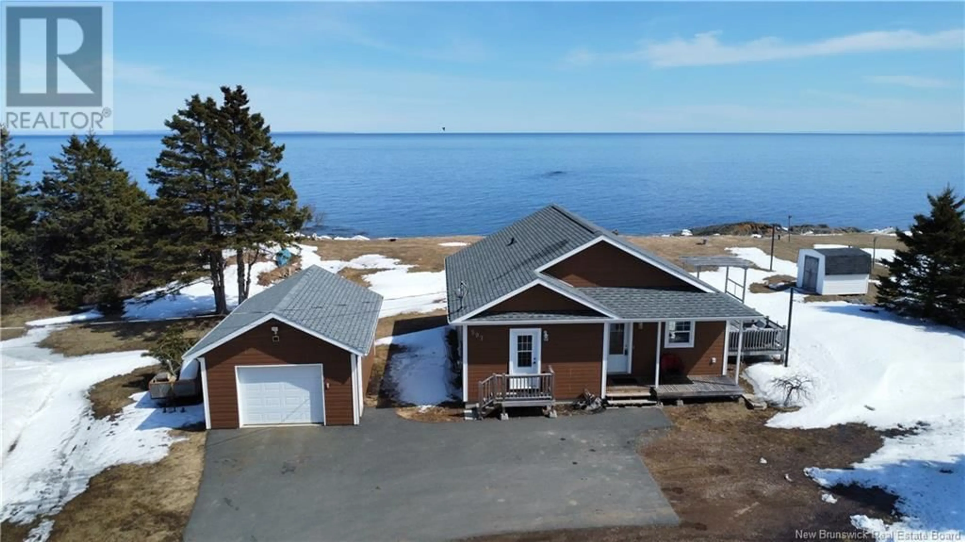 A pic from outside/outdoor area/front of a property/back of a property/a pic from drone, water/lake/river/ocean view for 597 PRINCIPAL, Pointe-Verte New Brunswick E8J2P8