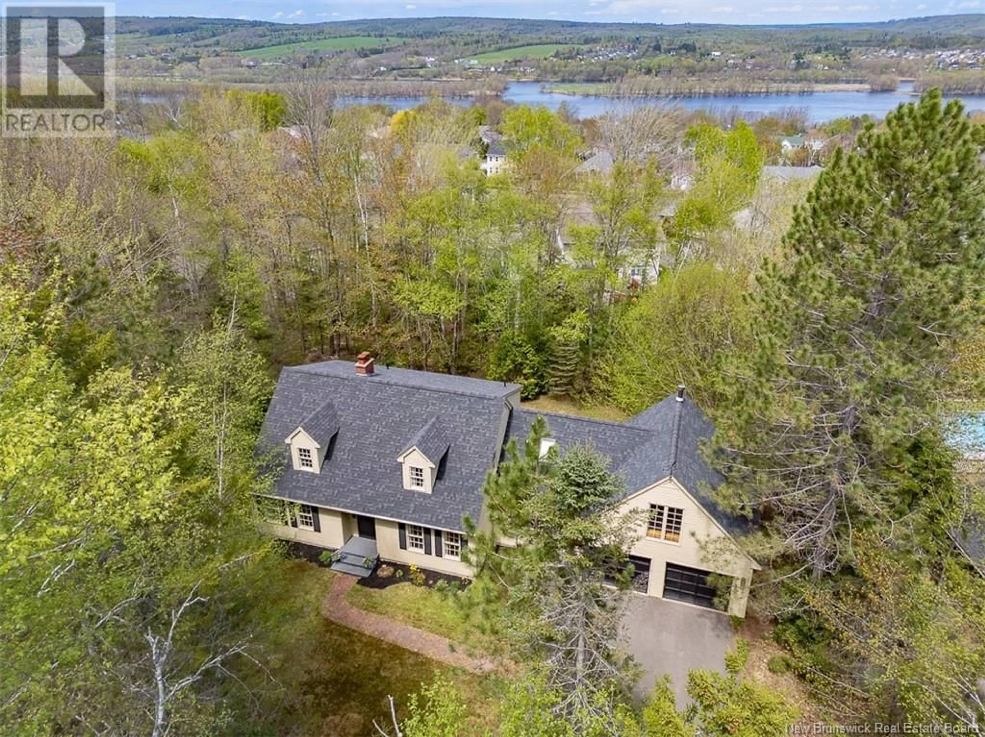 A pic from outside/outdoor area/front of a property/back of a property/a pic from drone, water/lake/river/ocean view for 375 SPRINGHILL ROAD, Fredericton New Brunswick E3C1S2
