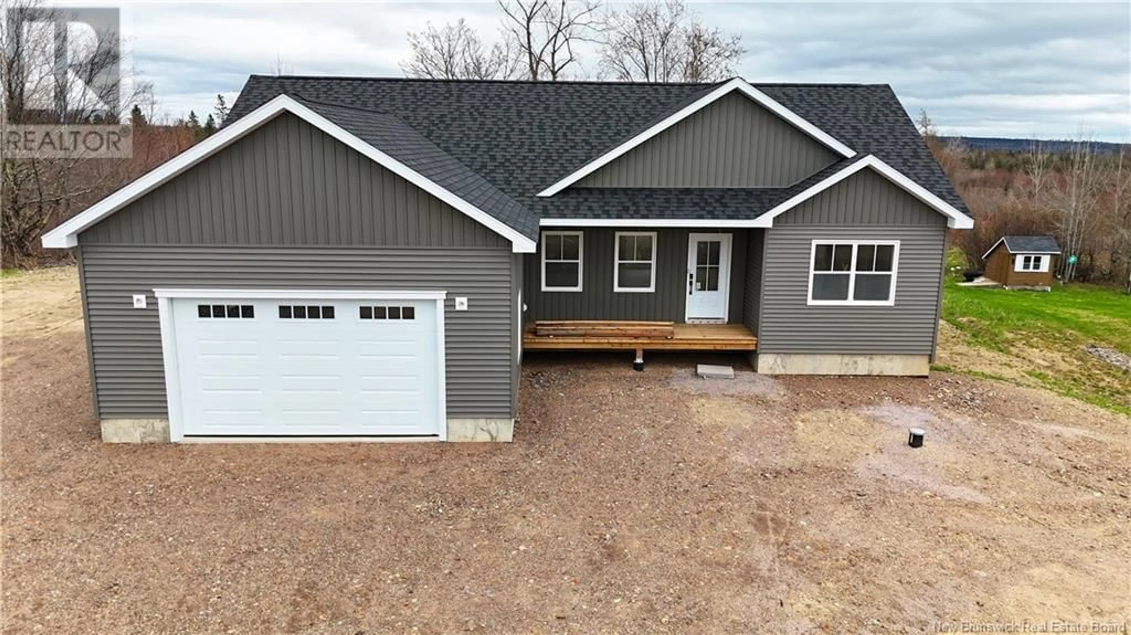 Home with vinyl exterior material, street for 19 ROBISON CRESCENT, Harvey Station New Brunswick E6K0C9