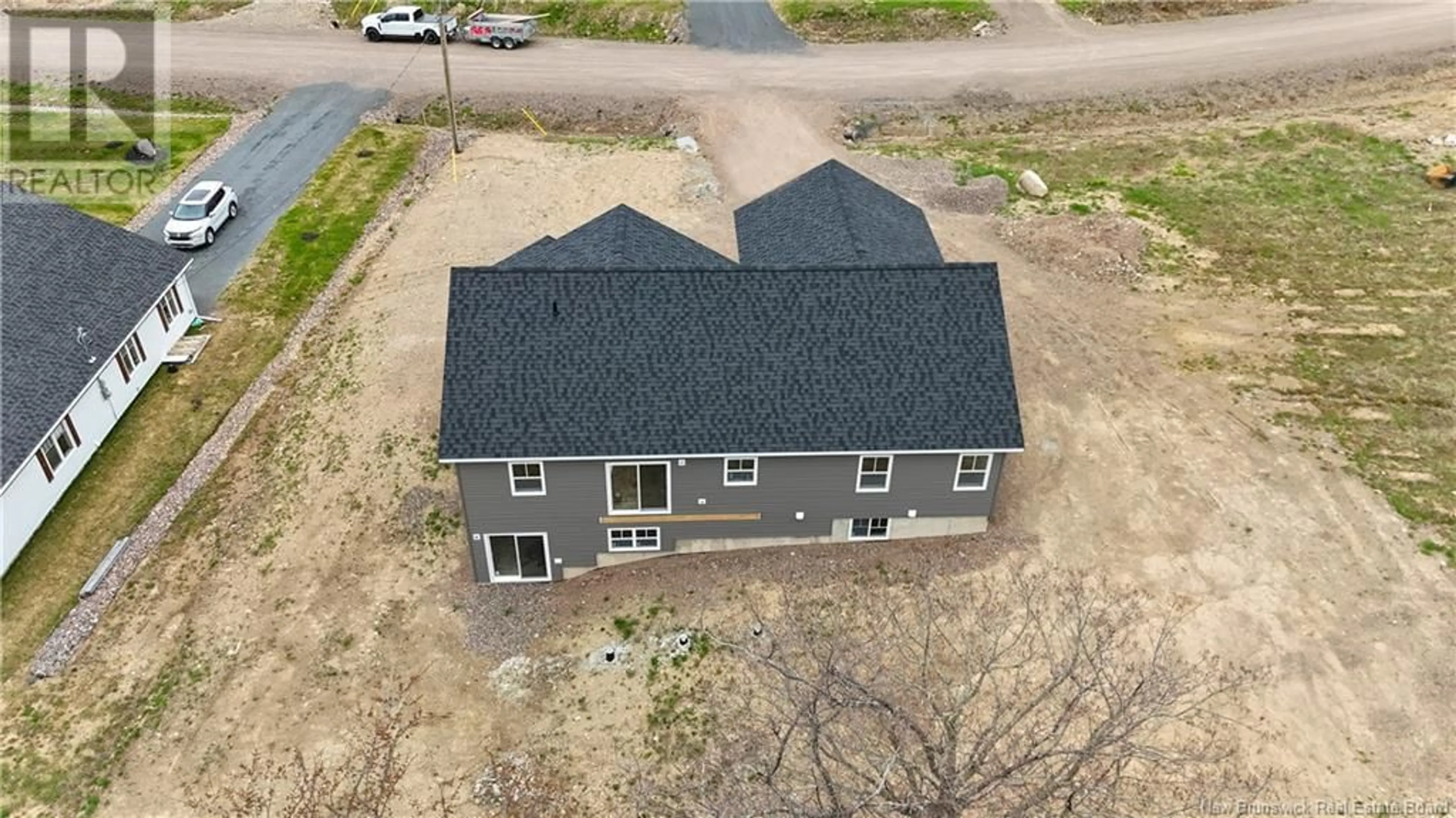 A pic from outside/outdoor area/front of a property/back of a property/a pic from drone, building for 19 ROBISON CRESCENT, Harvey Station New Brunswick E6K0C9