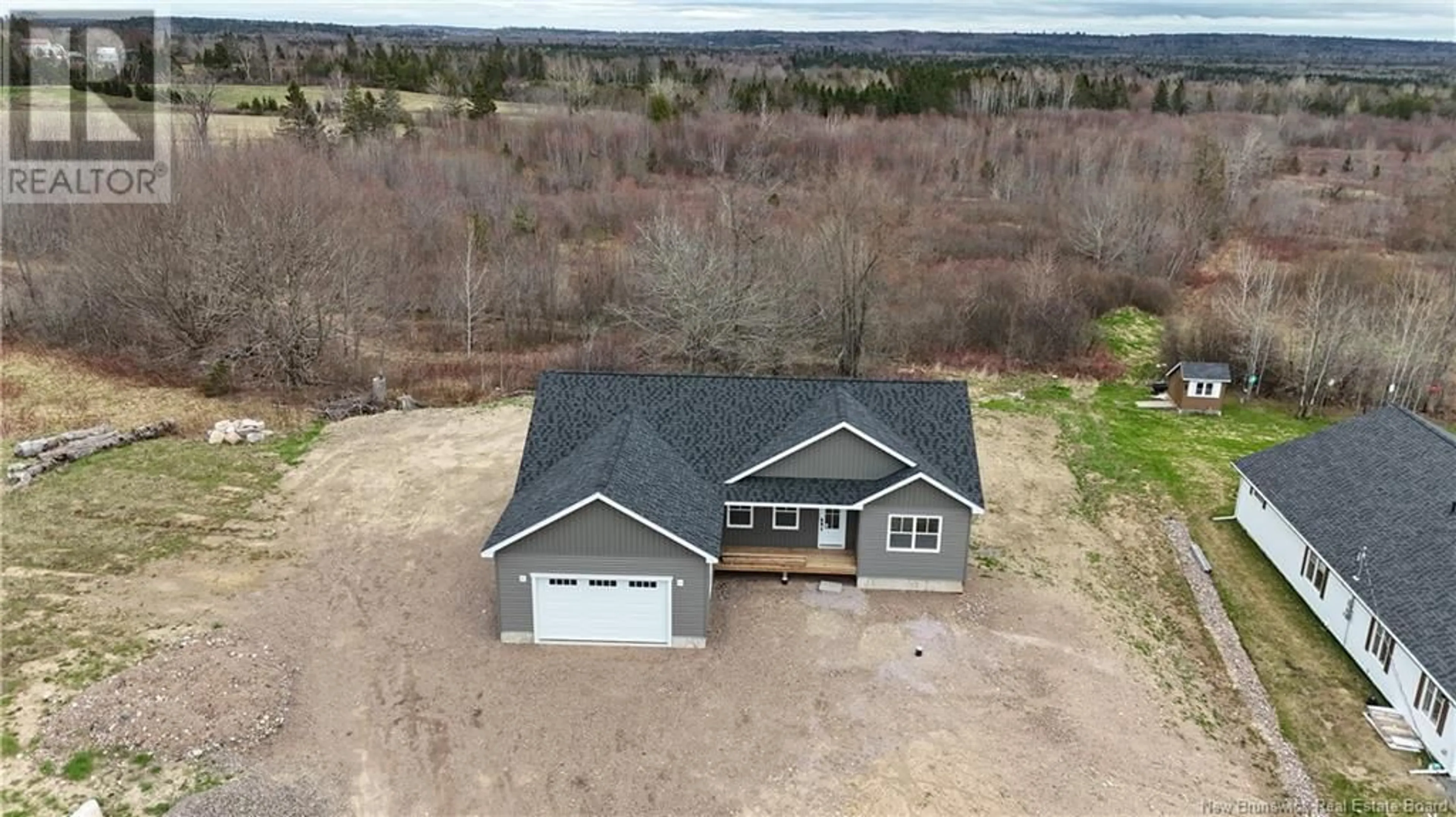 A pic from outside/outdoor area/front of a property/back of a property/a pic from drone, building for 19 ROBISON CRESCENT, Harvey Station New Brunswick E6K0C9