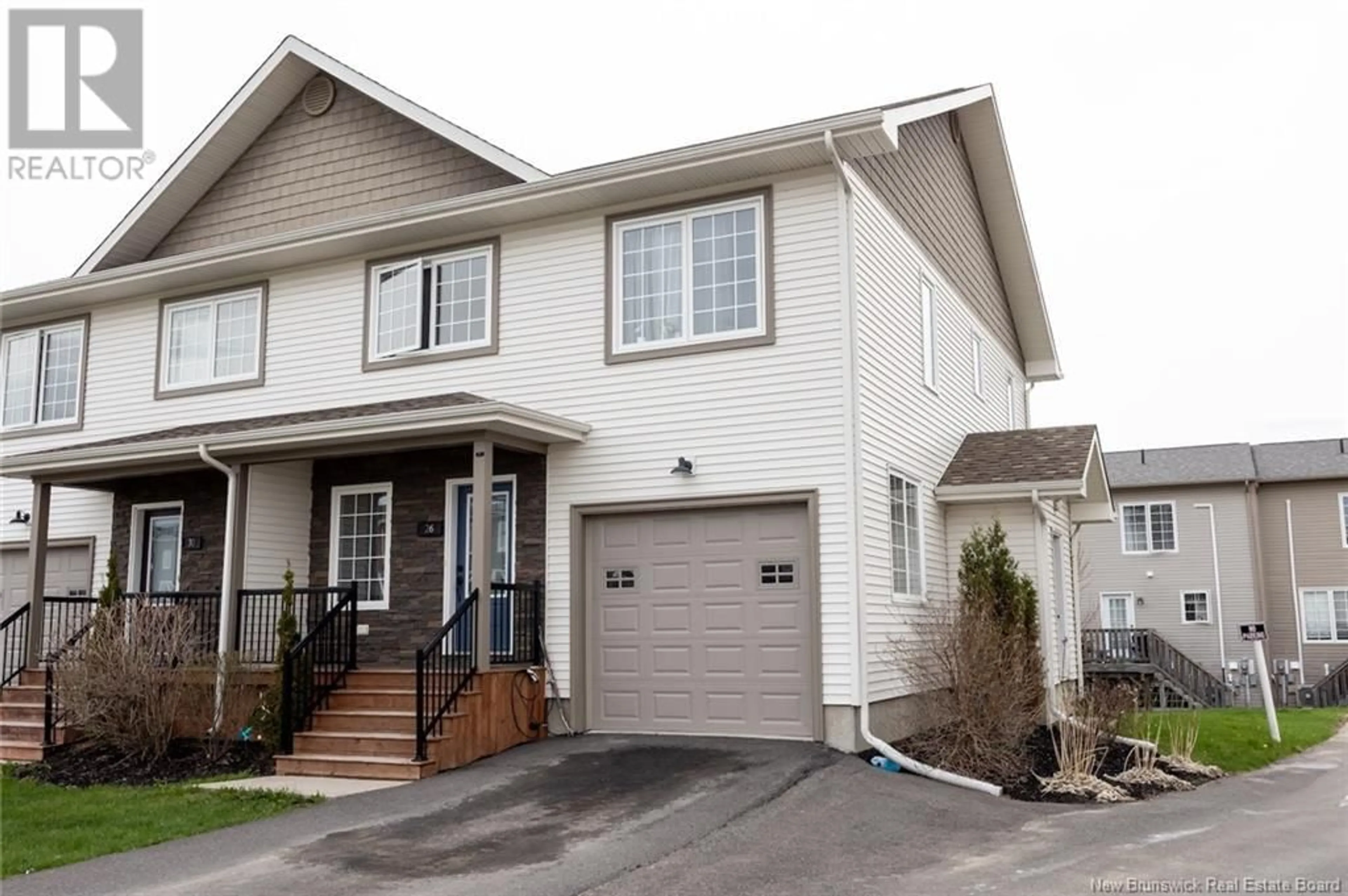 Home with vinyl exterior material, street for 26 MIA CIRCLE, Fredericton New Brunswick E3A7N5