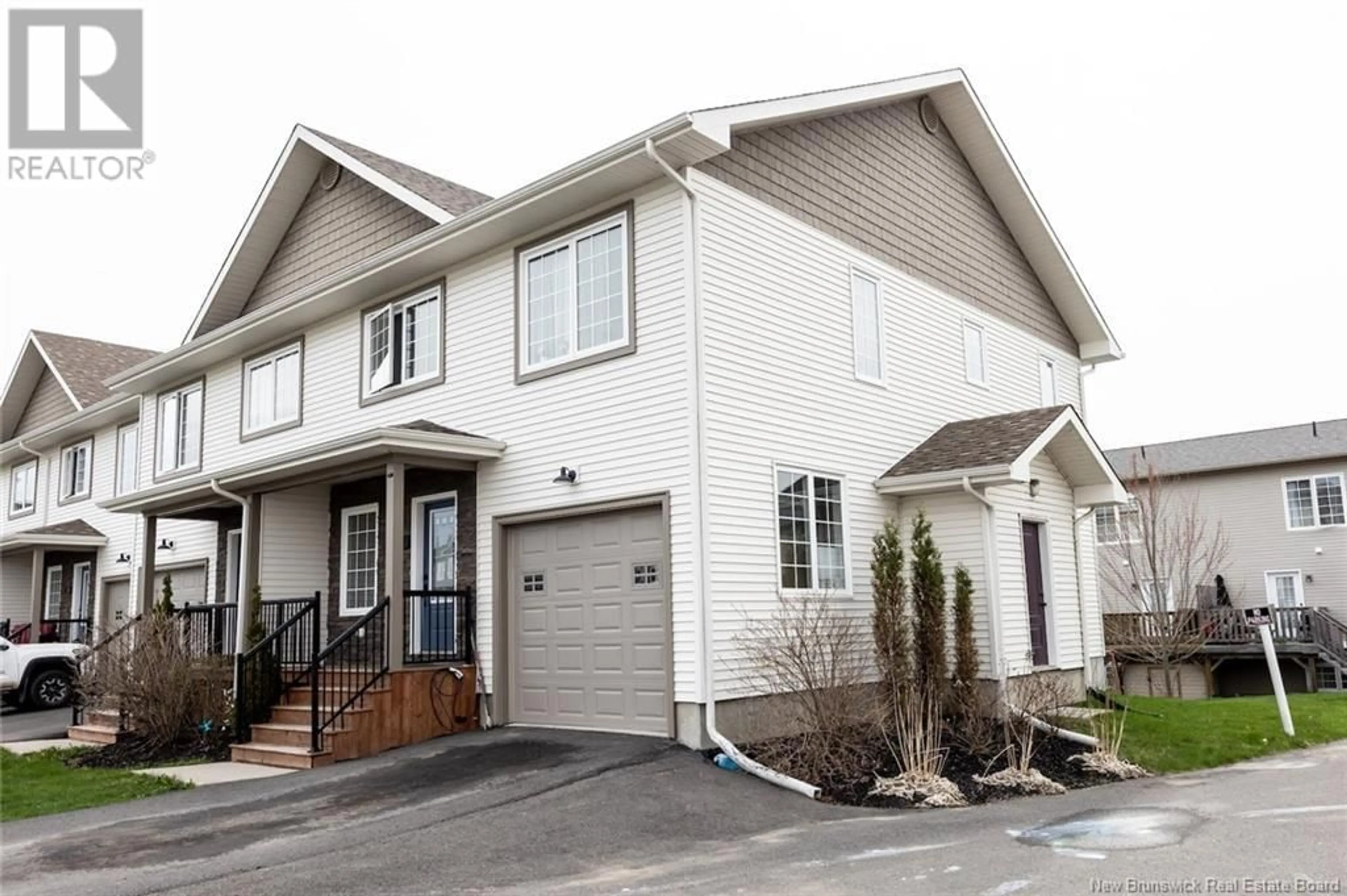 Home with vinyl exterior material, street for 26 MIA CIRCLE, Fredericton New Brunswick E3A7N5