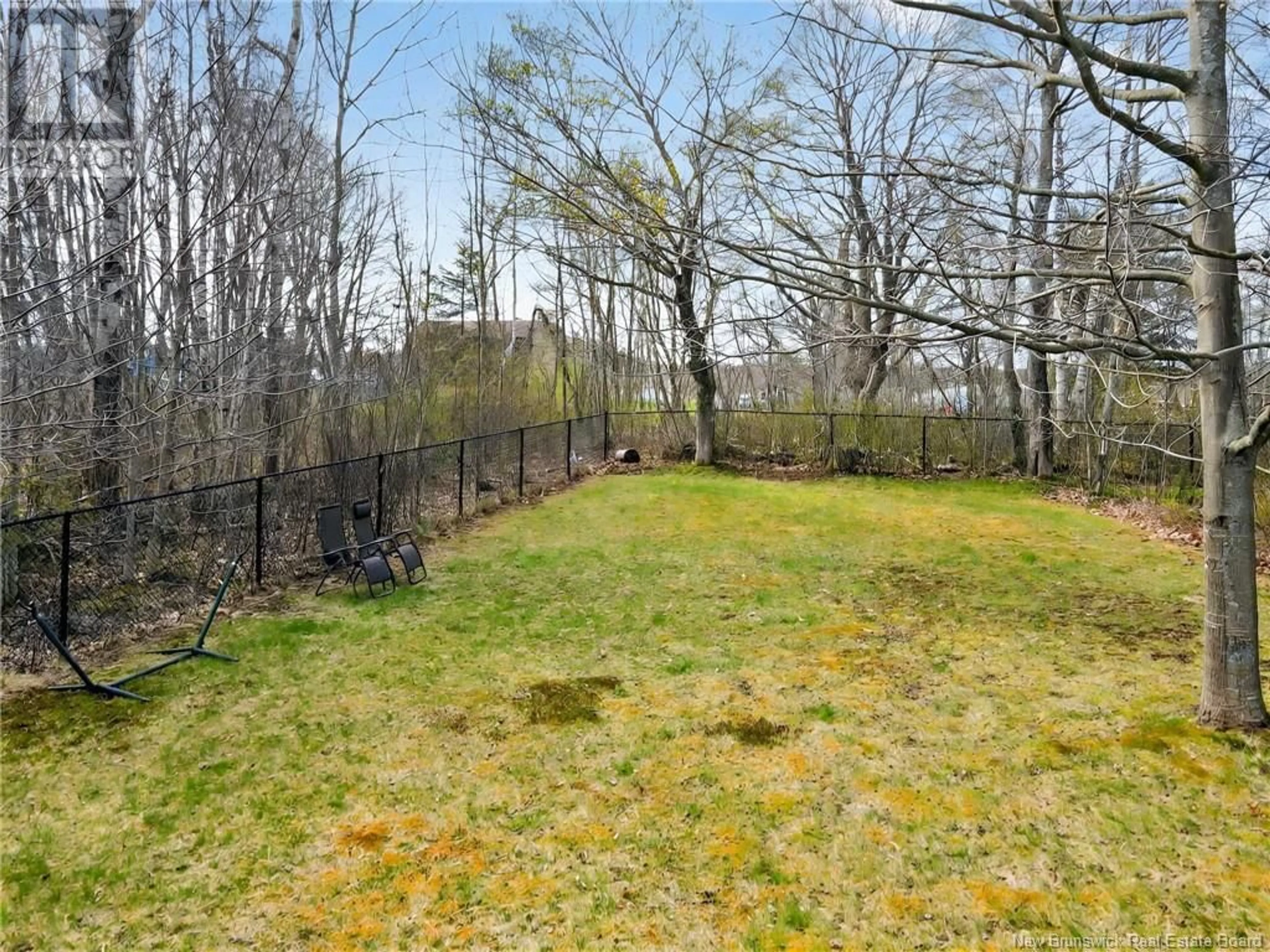 A pic from outside/outdoor area/front of a property/back of a property/a pic from drone, forest/trees view for 20 LIONEL STREET, Dieppe New Brunswick E1A8Z1