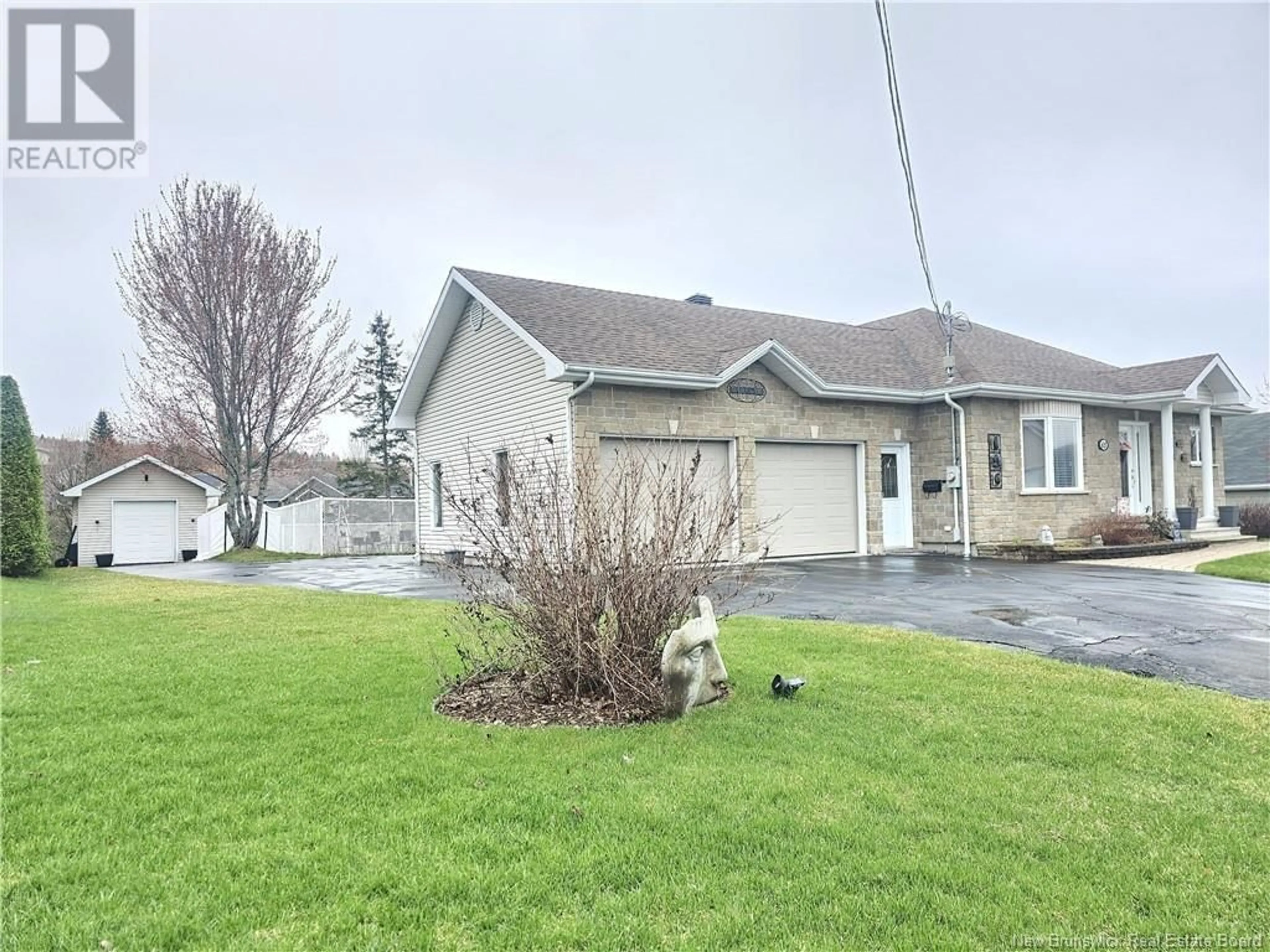 A pic from outside/outdoor area/front of a property/back of a property/a pic from drone, street for 65 MGR. DIONNE AVENUE, Edmundston New Brunswick E3V4B2