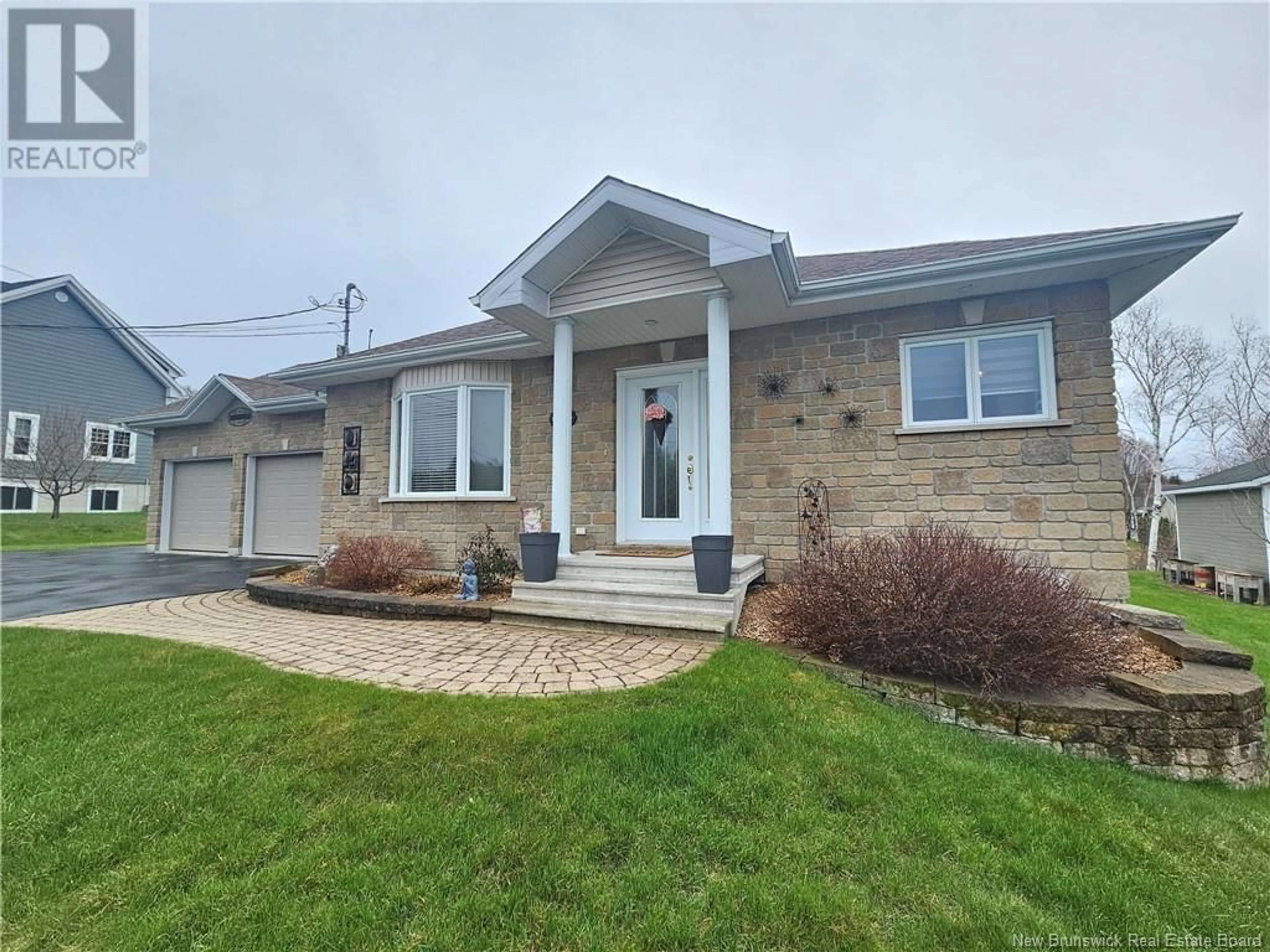 Home with vinyl exterior material, street for 65 MGR. DIONNE AVENUE, Edmundston New Brunswick E3V4B2