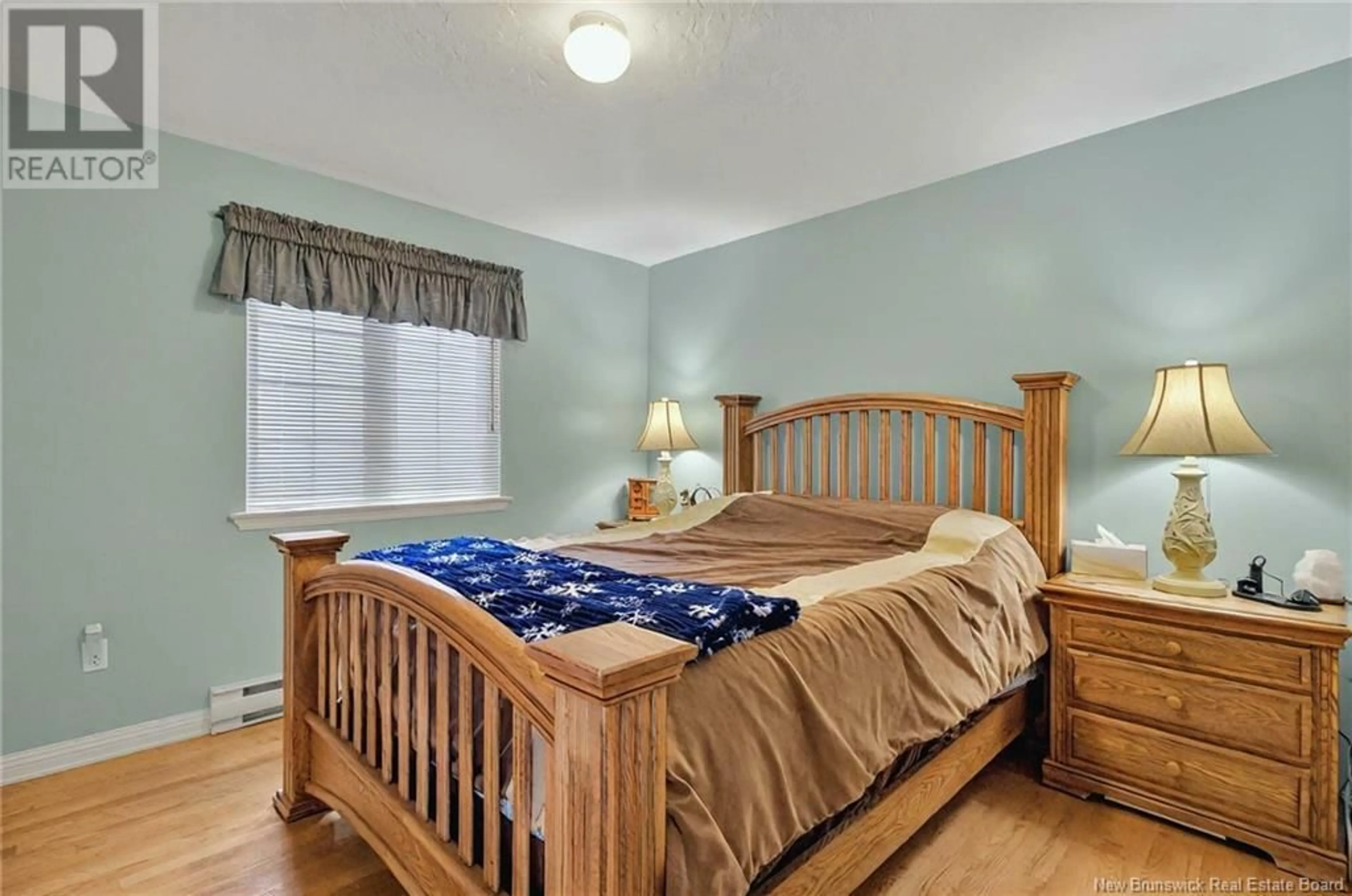 Bedroom with bed, wood/laminate floor for 462-464 EUNICE AVENUE, Dieppe New Brunswick E1A5V7