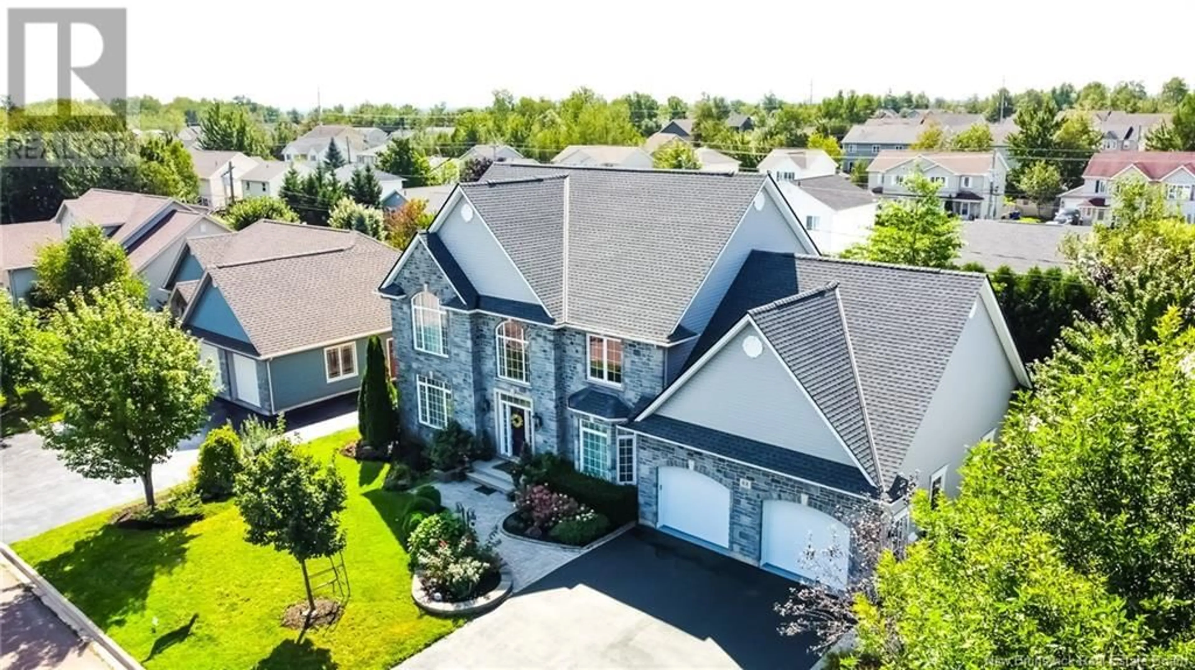 A pic from outside/outdoor area/front of a property/back of a property/a pic from drone, street for 88 FOXWOOD DRIVE, Moncton New Brunswick E1G5H4