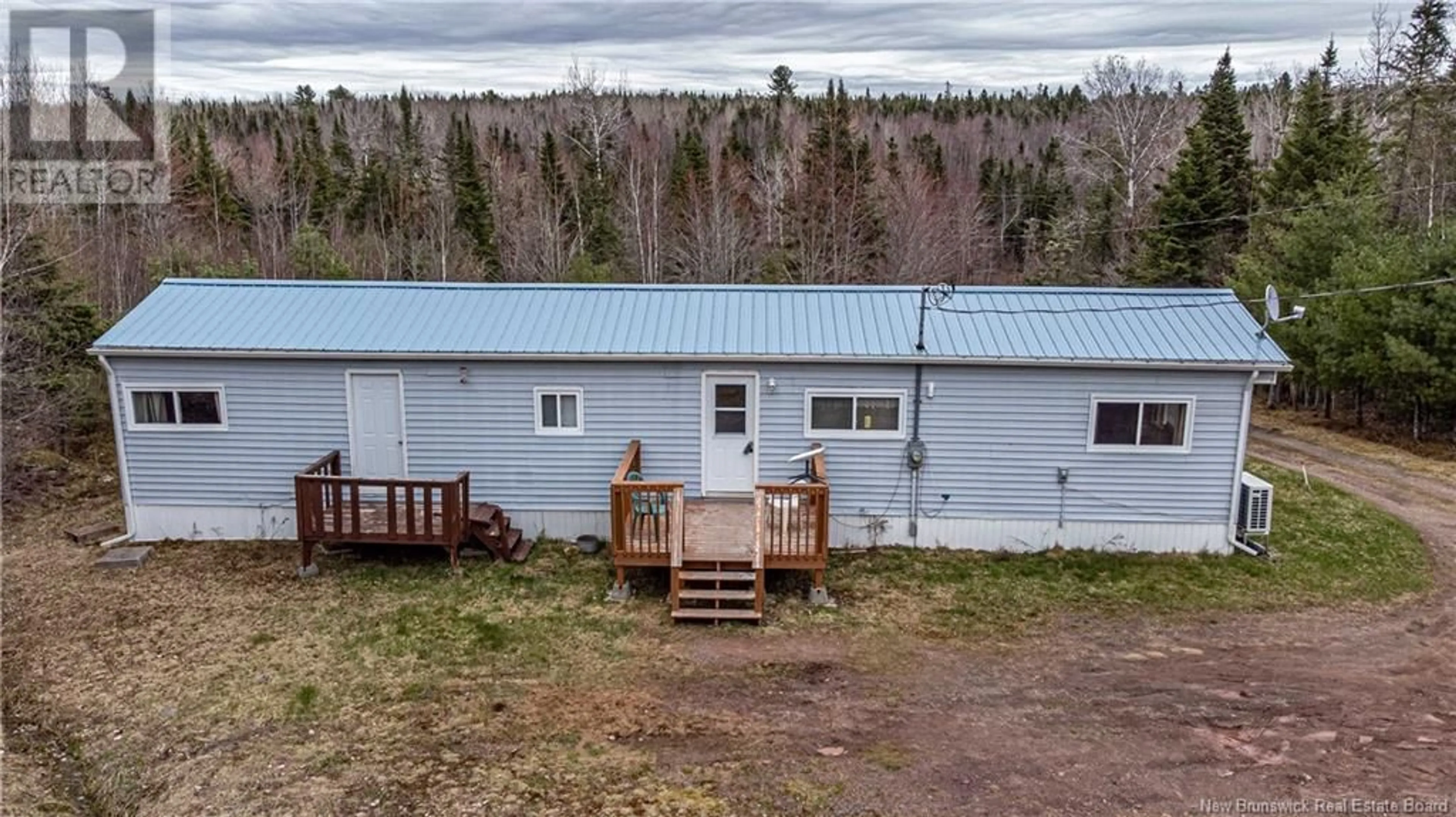 A pic from outside/outdoor area/front of a property/back of a property/a pic from drone, unknown for 151 STEVENS ROAD, Whites Cove New Brunswick E4C0A3