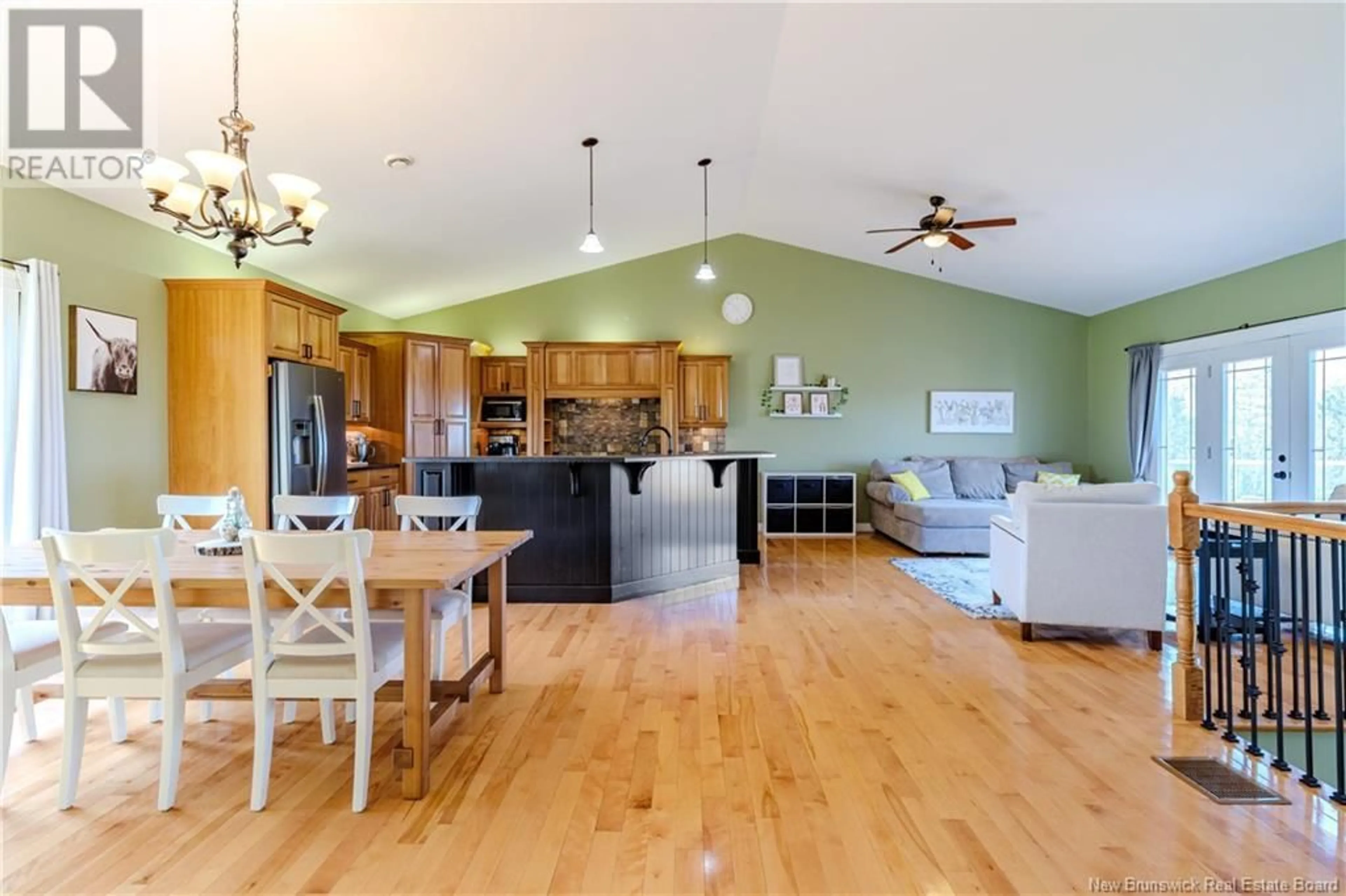 Open concept kitchen, wood/laminate floor for 38 ARCHANGEL WAY, Keswick Ridge New Brunswick E6L0A5