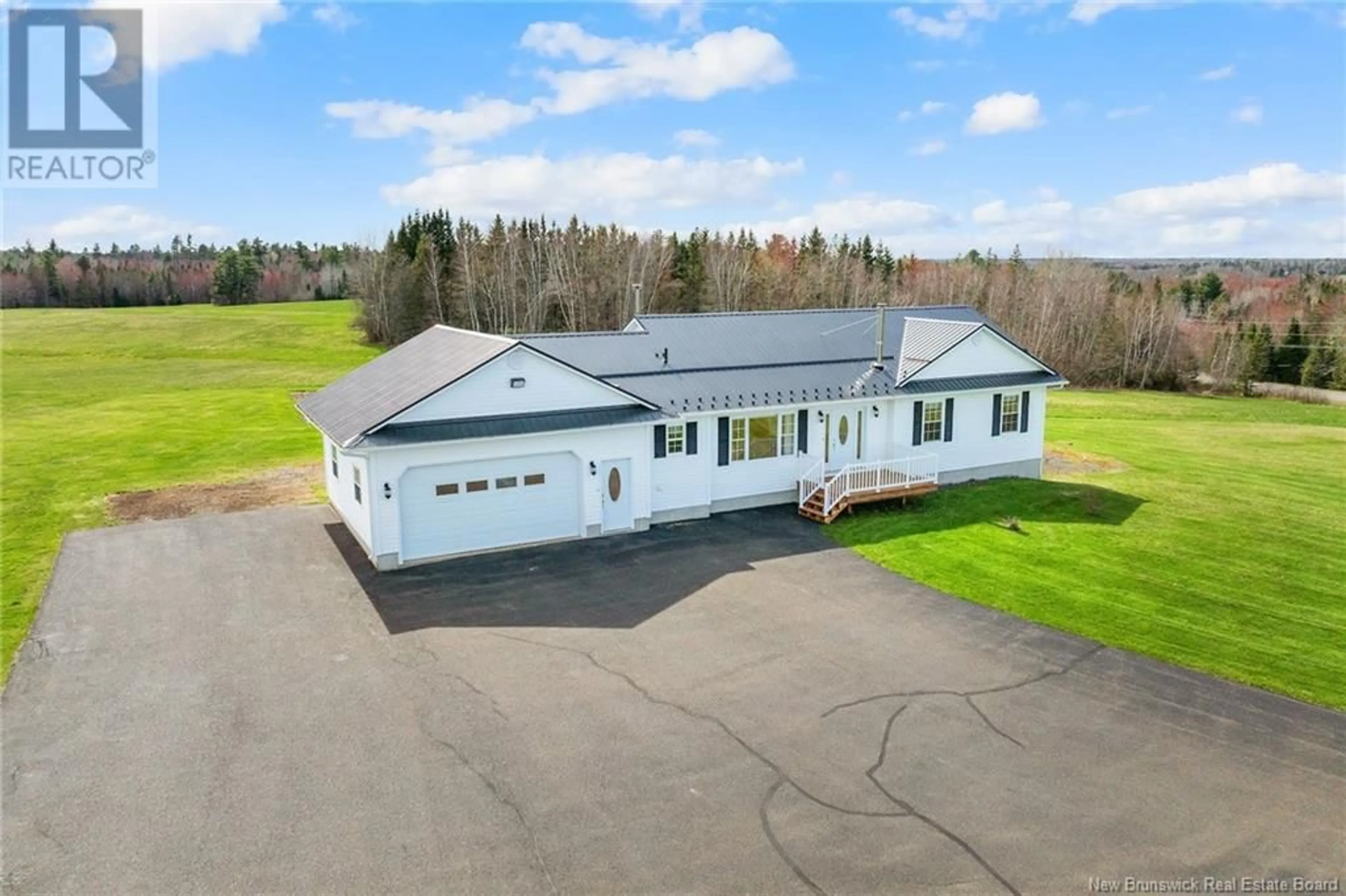 A pic from outside/outdoor area/front of a property/back of a property/a pic from drone, building for 151 RIVERSIDE DRIVE, Fredericton Junction New Brunswick E5L1V6