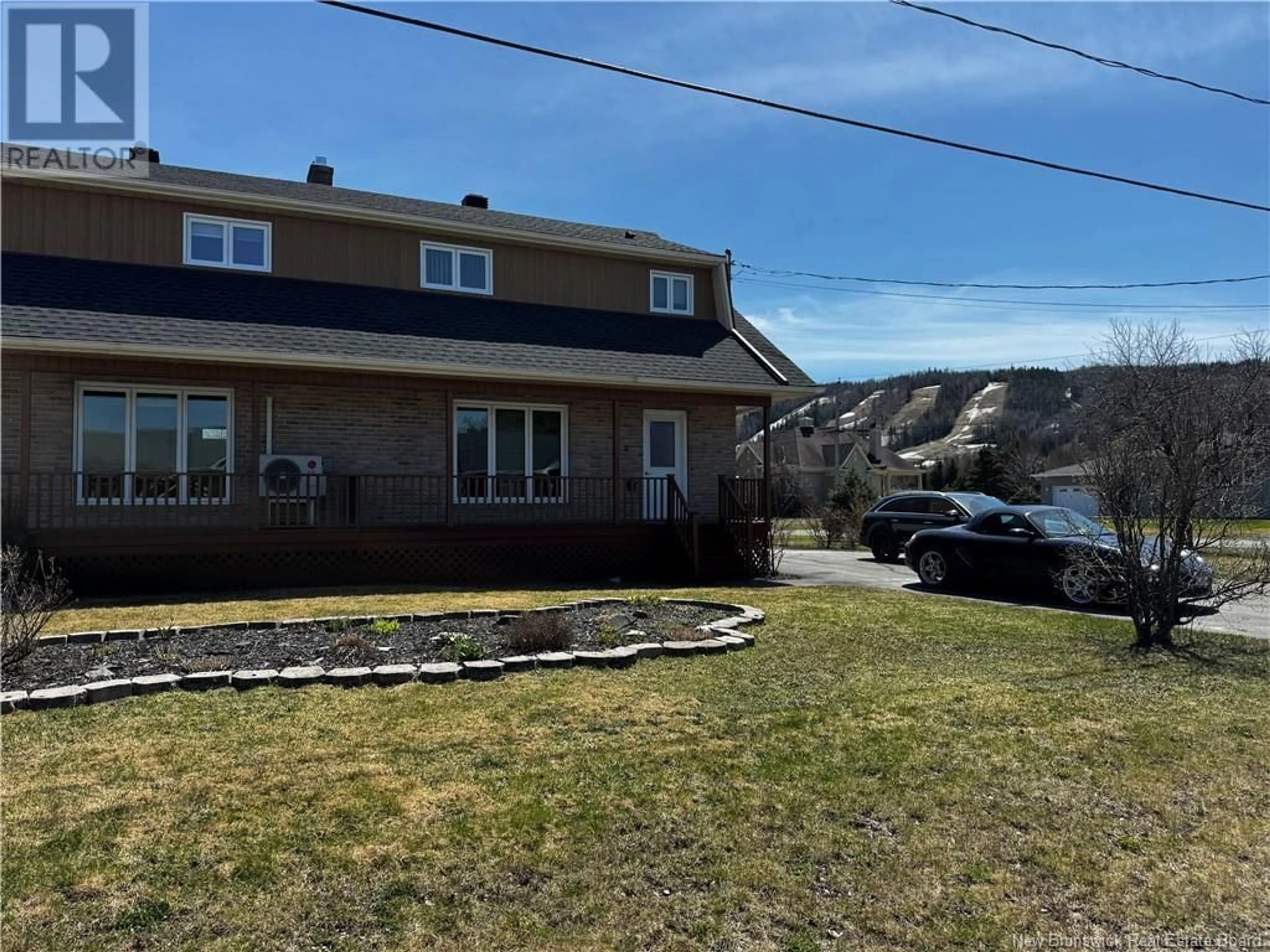 A pic from outside/outdoor area/front of a property/back of a property/a pic from drone, street for 2 CLAVETTE STREET, Saint-Jacques New Brunswick E7B1C4