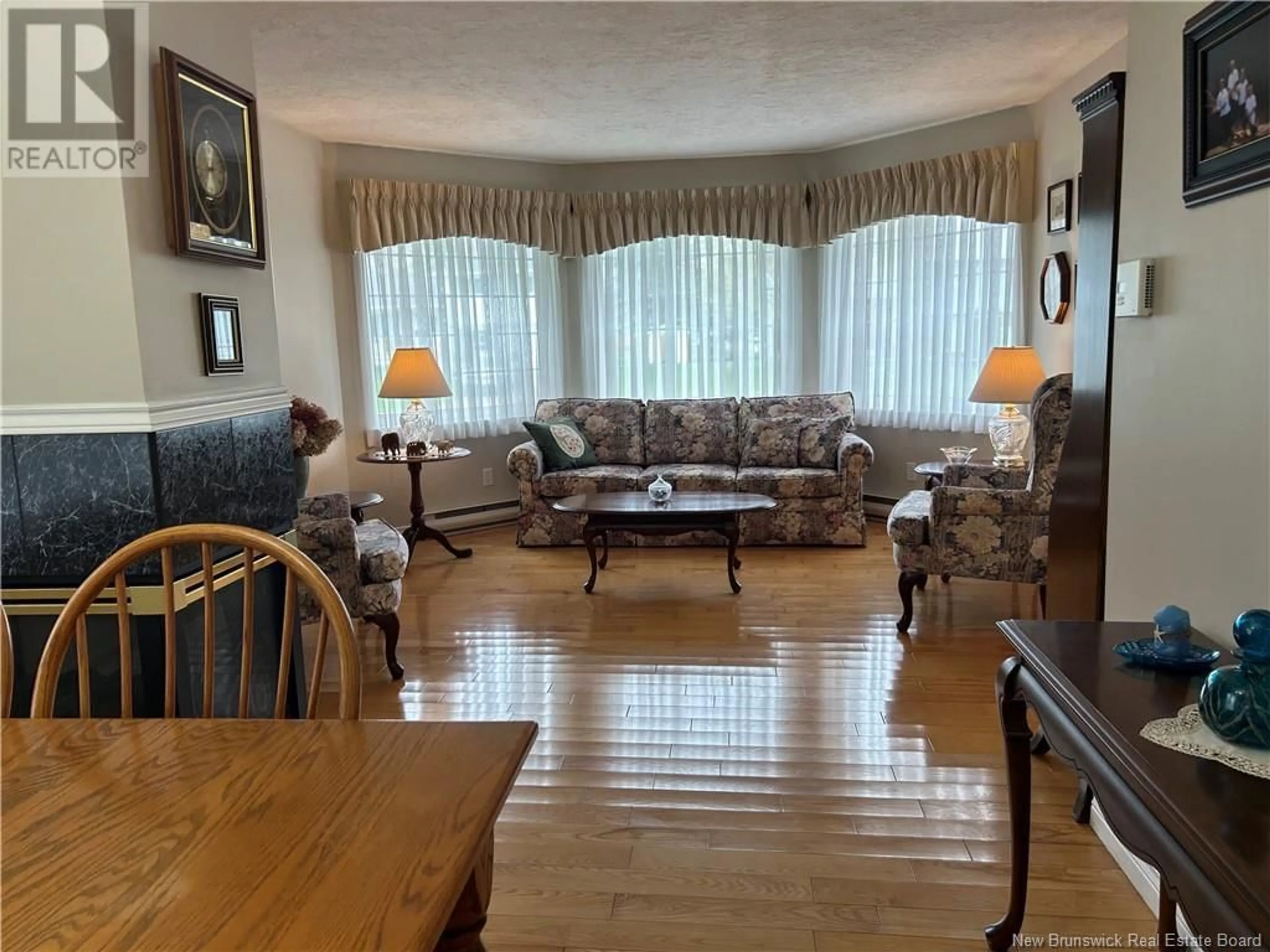 Living room with furniture, wood/laminate floor for 369 CALLOWHILL ROAD, Riverview New Brunswick E1B4N3