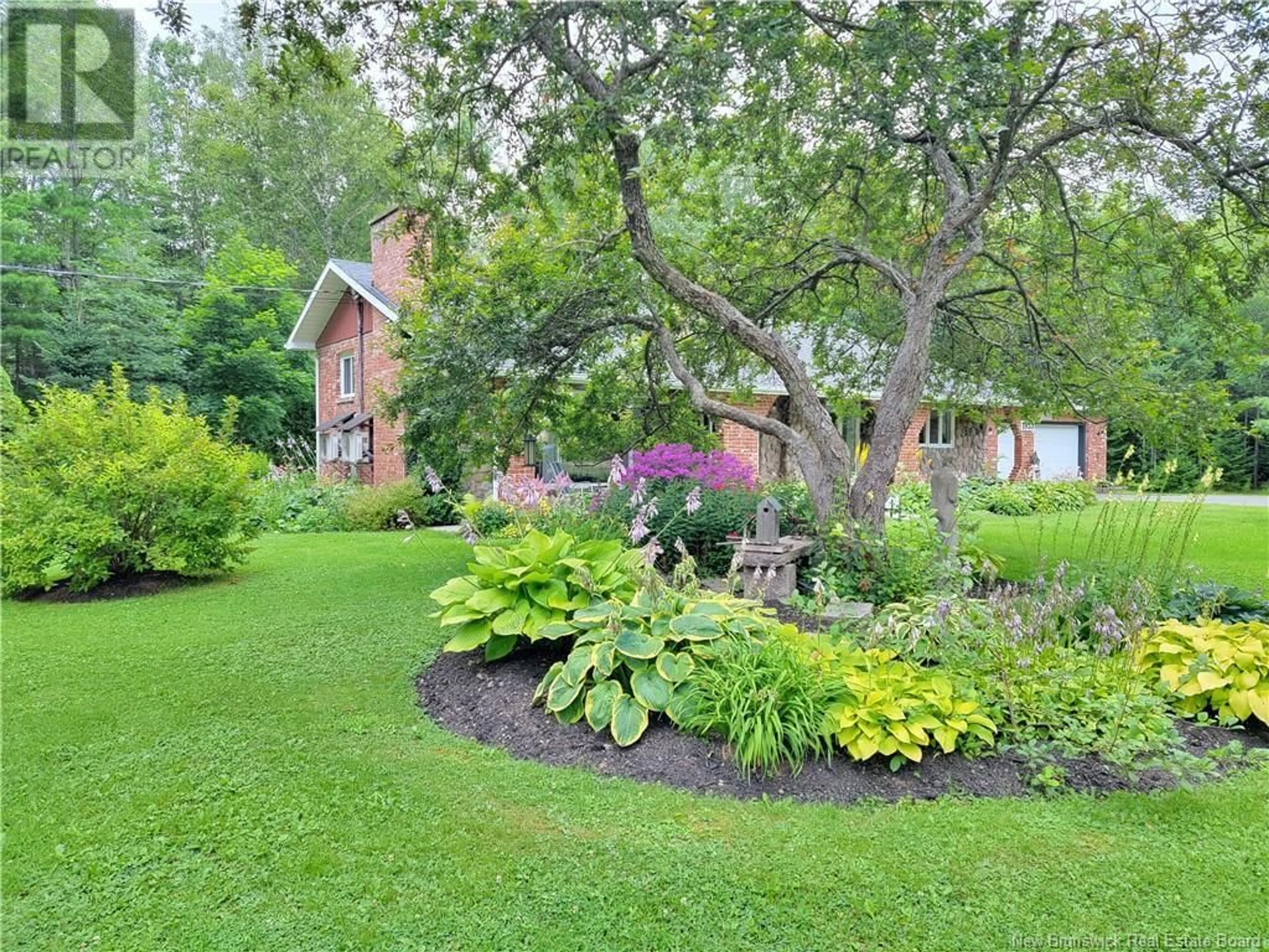 A pic from outside/outdoor area/front of a property/back of a property/a pic from drone, unknown for 1935 PALMER, Bathurst New Brunswick E2A4X7