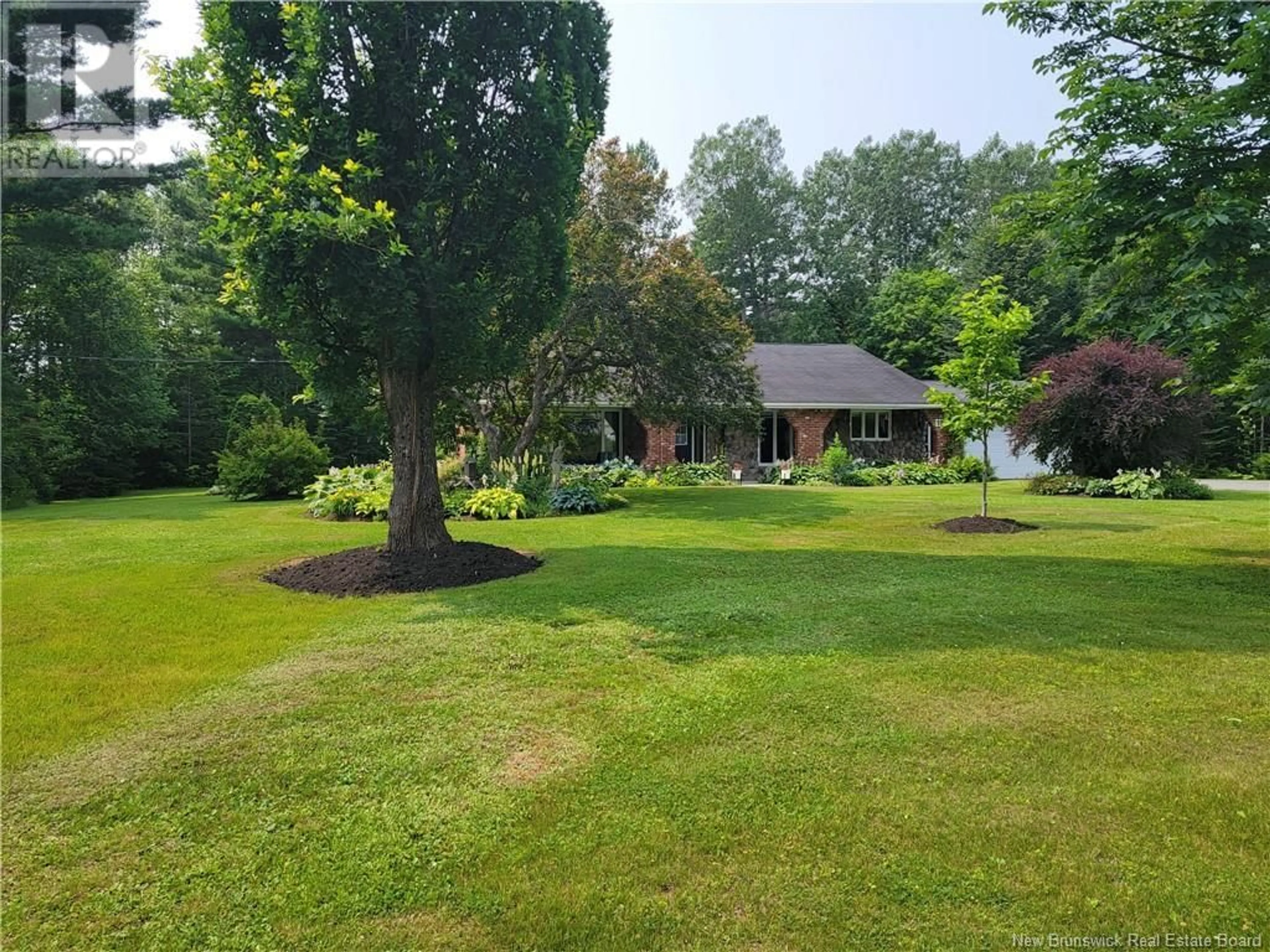 A pic from outside/outdoor area/front of a property/back of a property/a pic from drone, water/lake/river/ocean view for 1935 PALMER, Bathurst New Brunswick E2A4X7