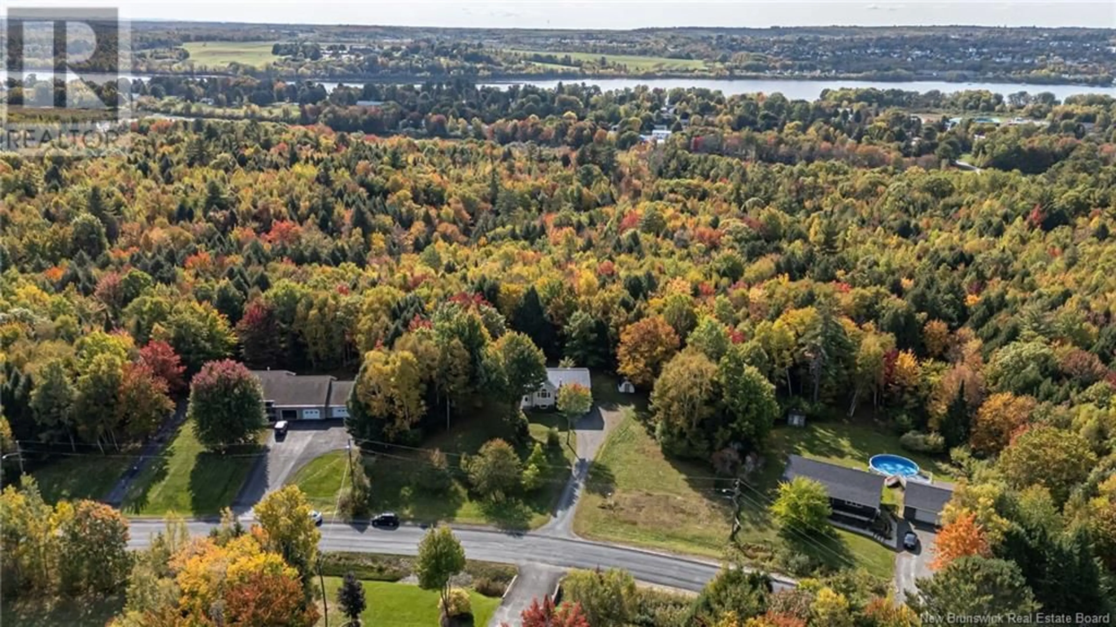 A pic from outside/outdoor area/front of a property/back of a property/a pic from drone, forest/trees view for 30 SHALLON LANE, Richibucto Road New Brunswick E3A1E5