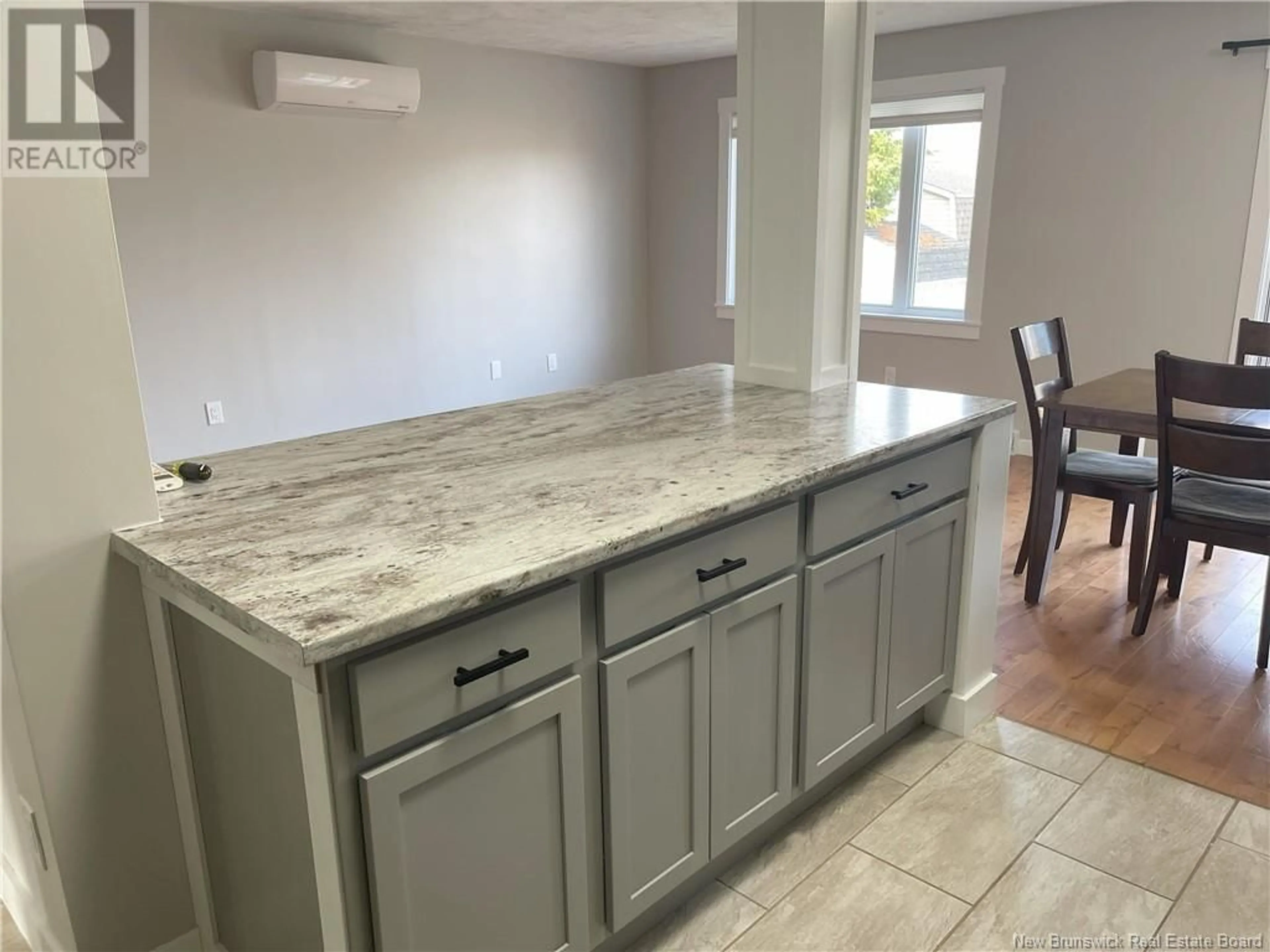 Open concept kitchen, ceramic/tile floor for 29-31 BERRY STREET, Moncton New Brunswick E1A6G3