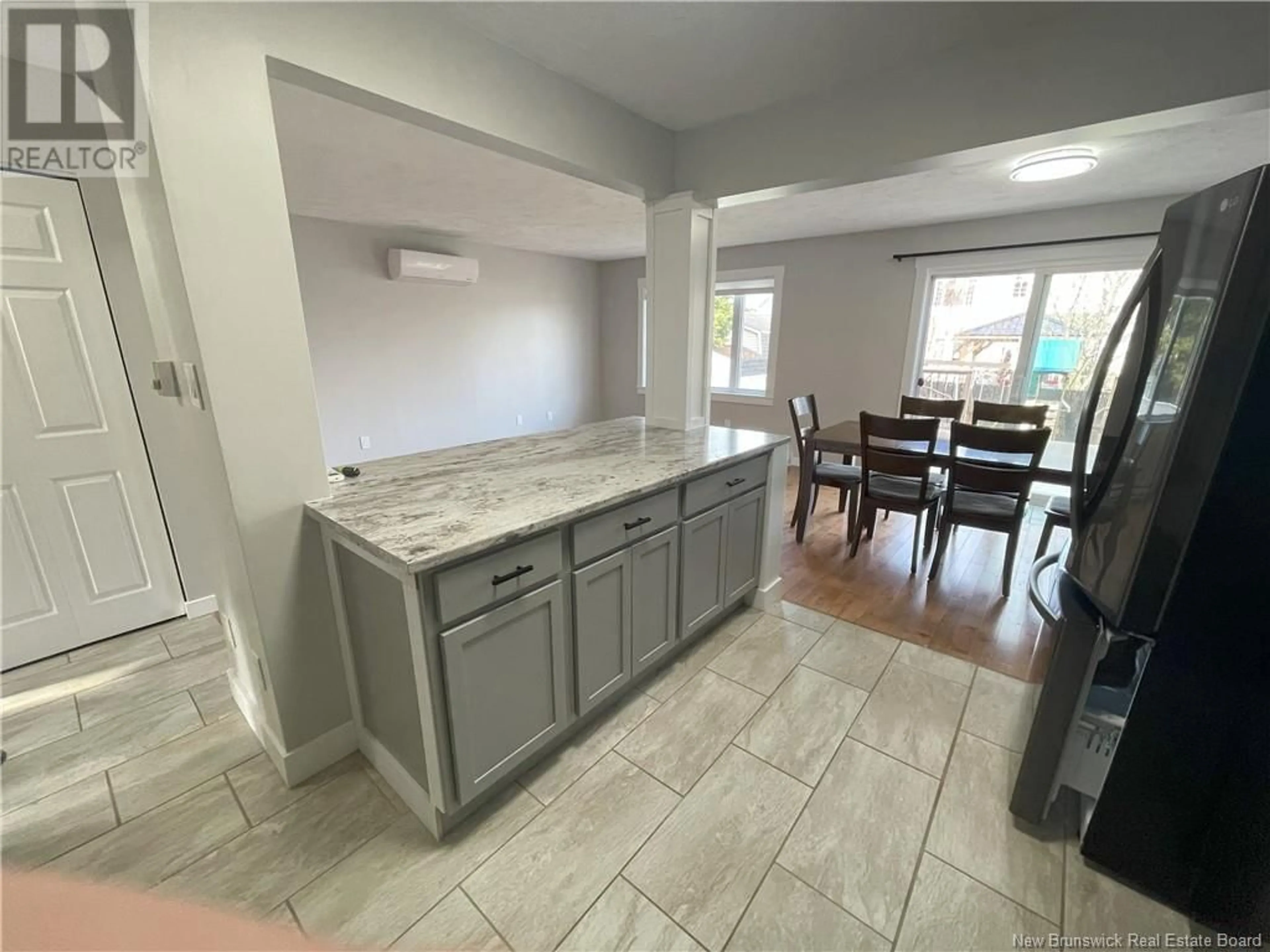 Open concept kitchen, ceramic/tile floor for 29-31 BERRY STREET, Moncton New Brunswick E1A6G3