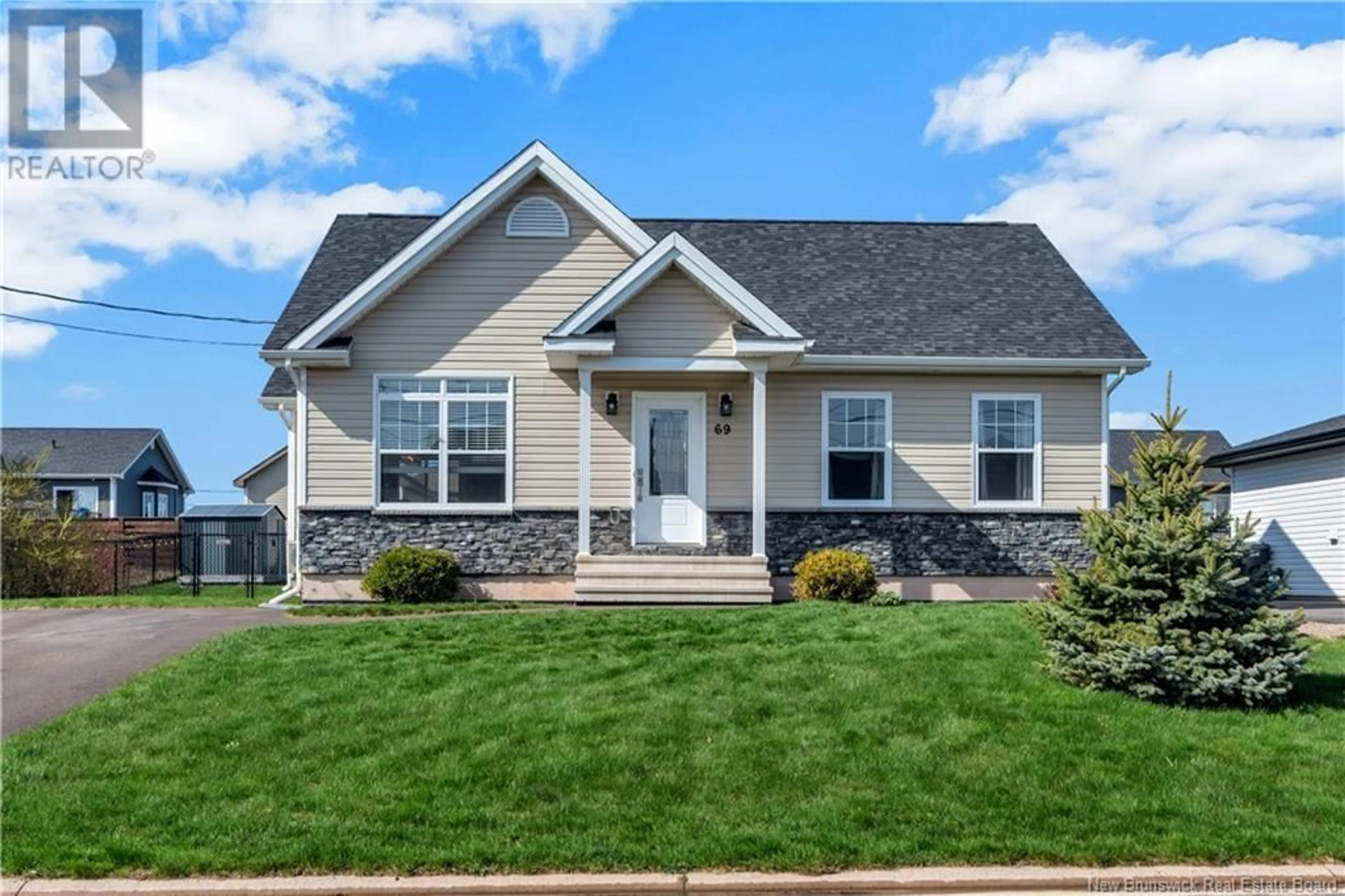 Home with vinyl exterior material, street for 69 MATHIAS STREET, Dieppe New Brunswick E1A9H7