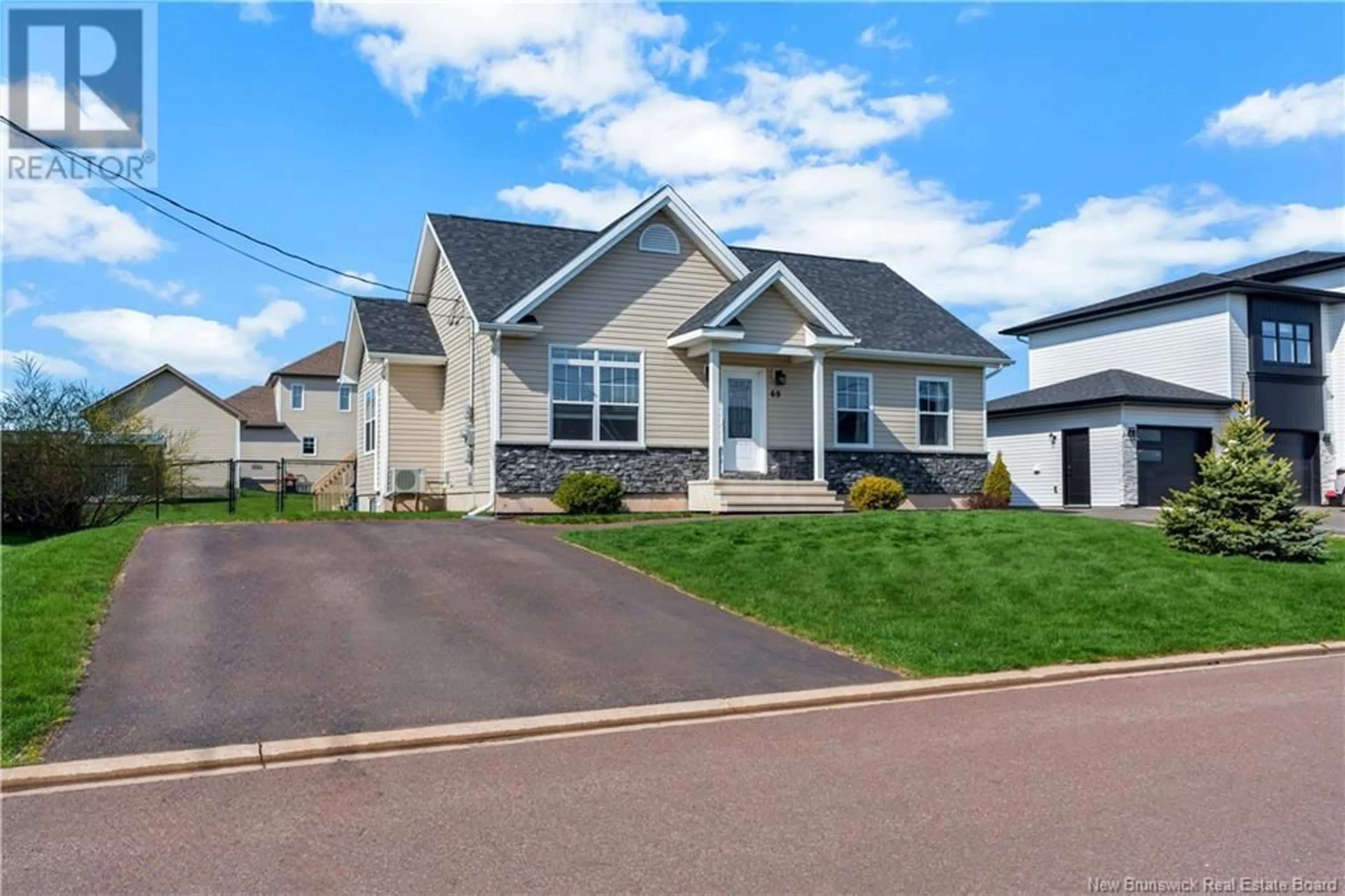 Home with vinyl exterior material, street for 69 MATHIAS STREET, Dieppe New Brunswick E1A9H7