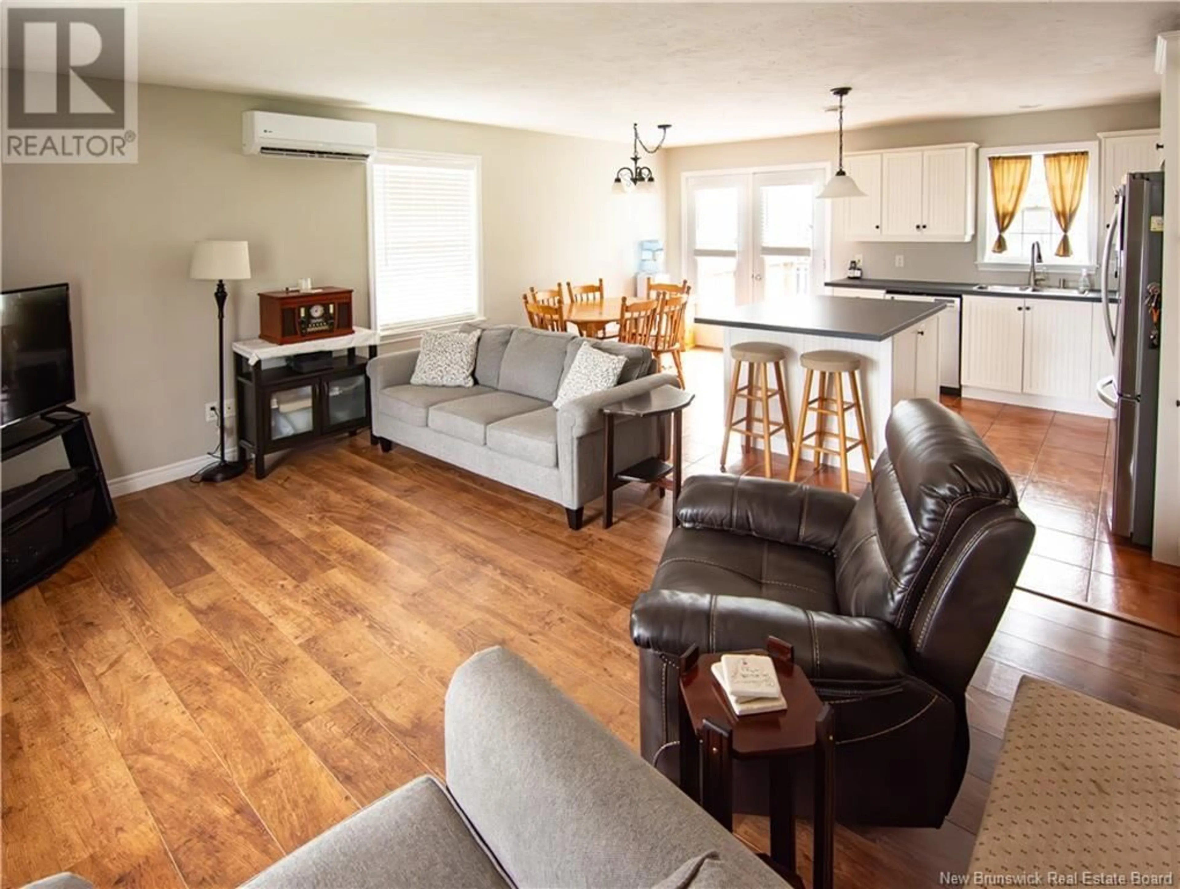 Living room with furniture, wood/laminate floor for 19 MACDONALD ROAD, Salisbury New Brunswick E4J2J5