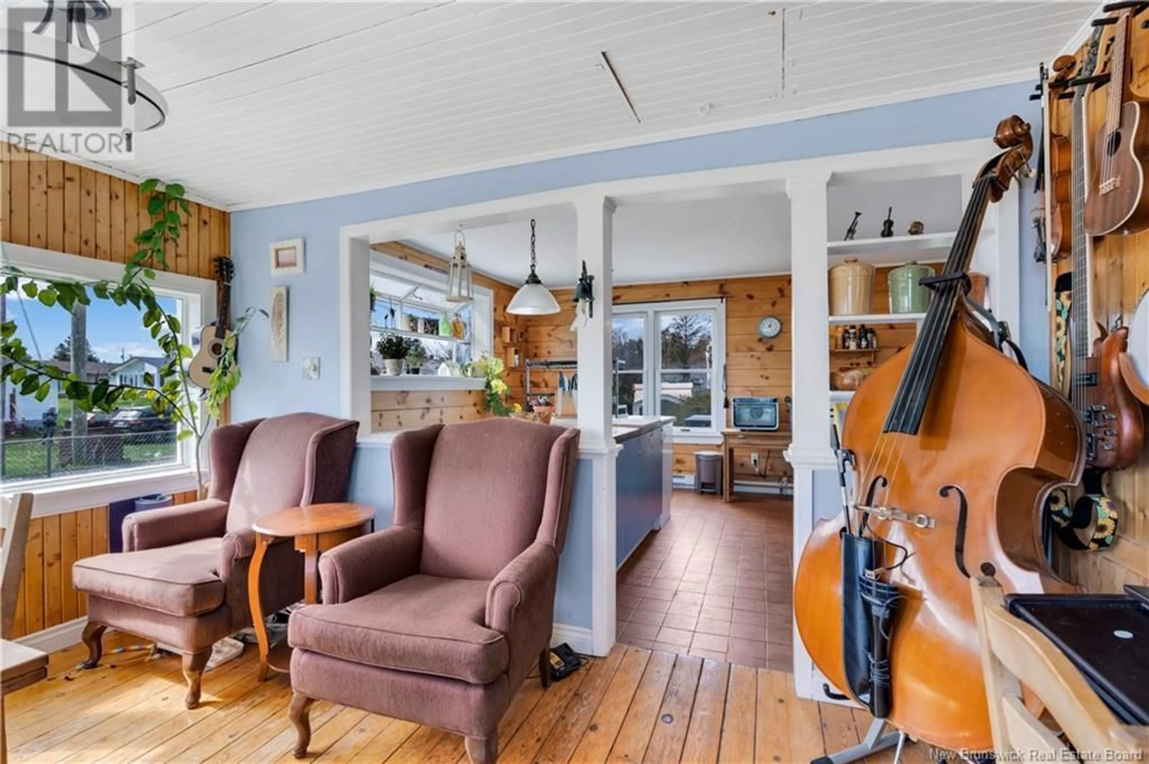Living room with furniture, wood/laminate floor for 383 CHEMIN DE LA COTE, Grande-Digue New Brunswick E4R4A9