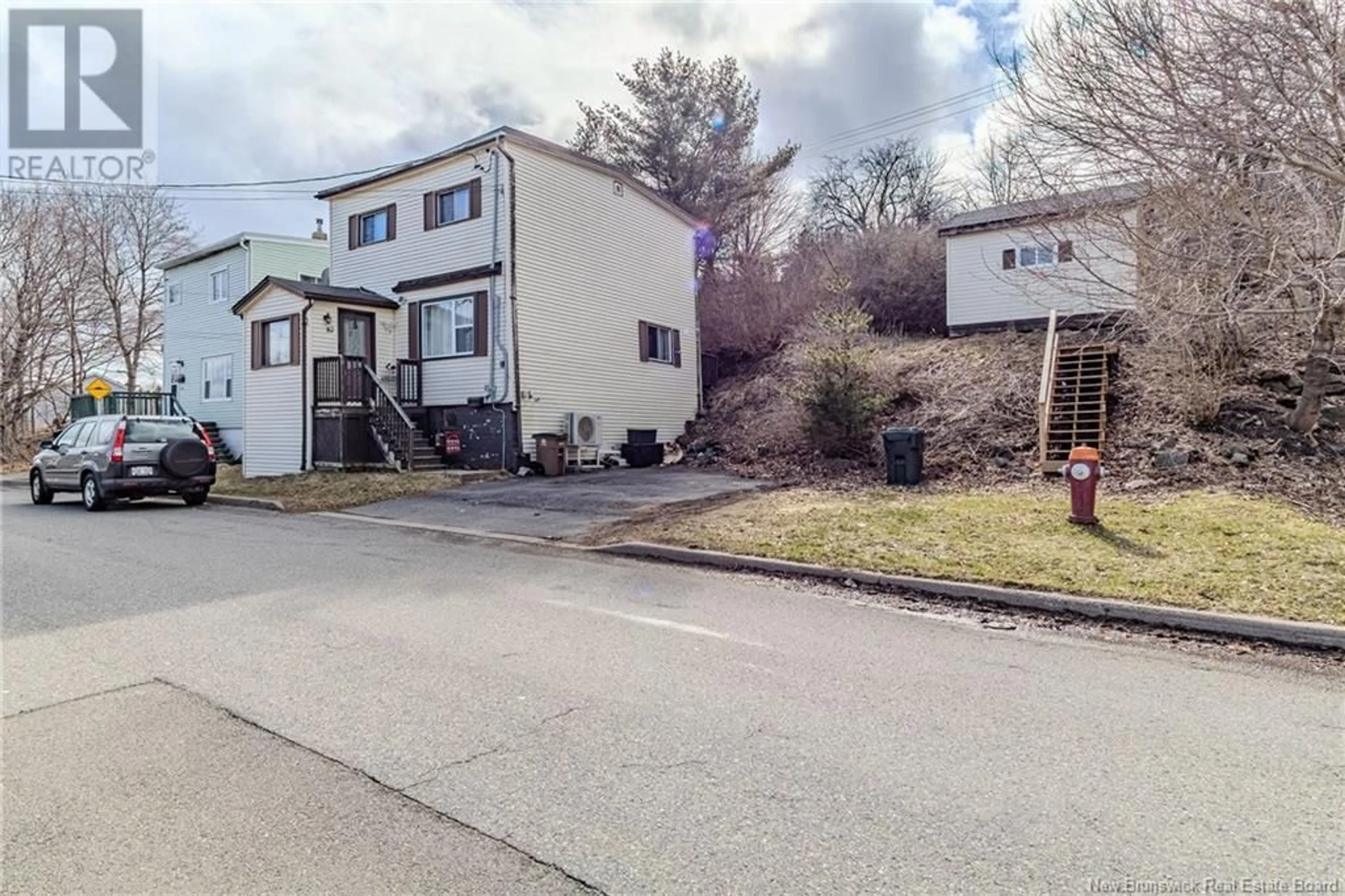 A pic from outside/outdoor area/front of a property/back of a property/a pic from drone, street for 82 SPAR COVE ROAD, Saint John New Brunswick E2K1S1