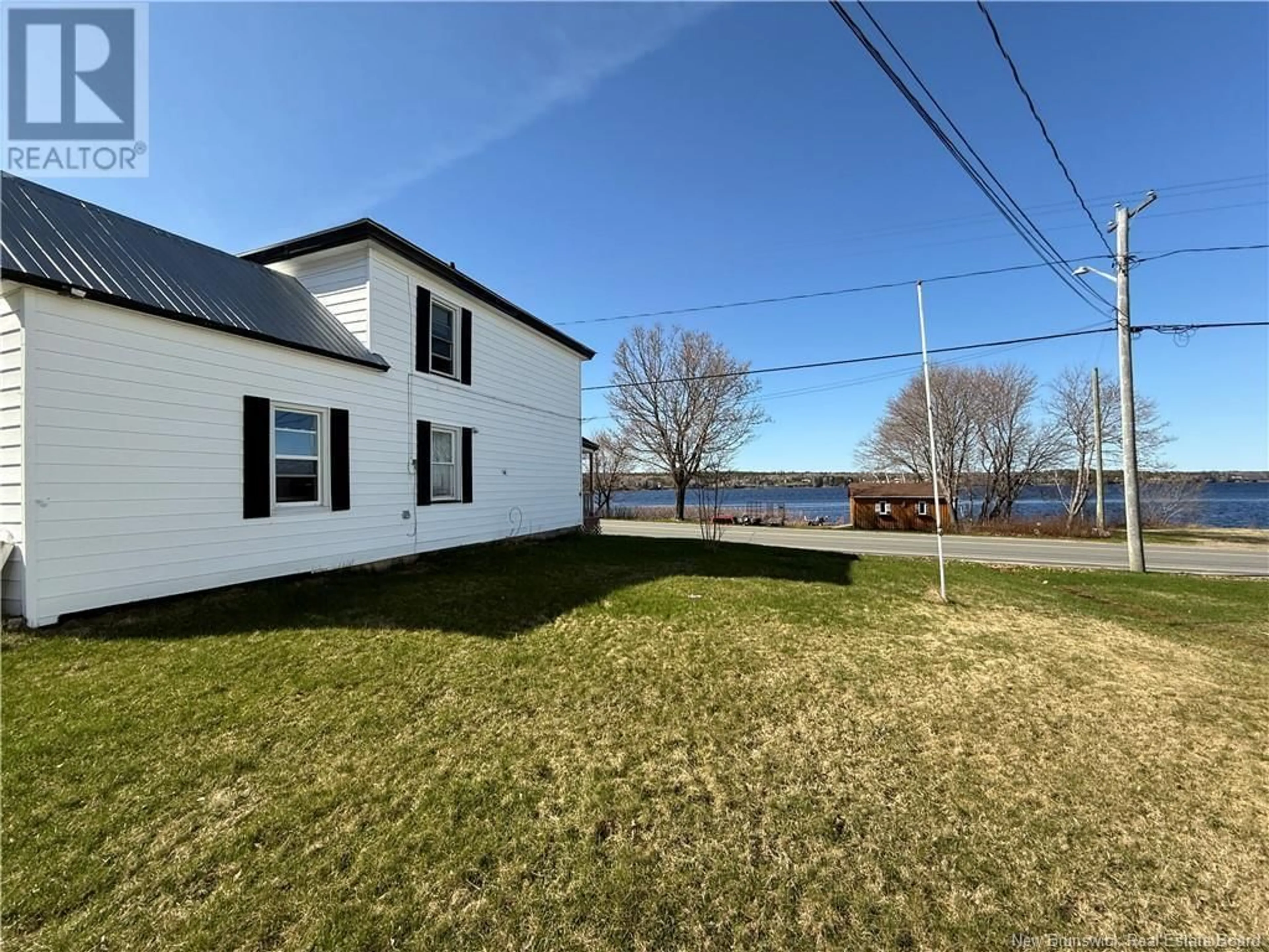 A pic from outside/outdoor area/front of a property/back of a property/a pic from drone, water/lake/river/ocean view for 4388 WATER STREET, Miramichi New Brunswick E1N4L6