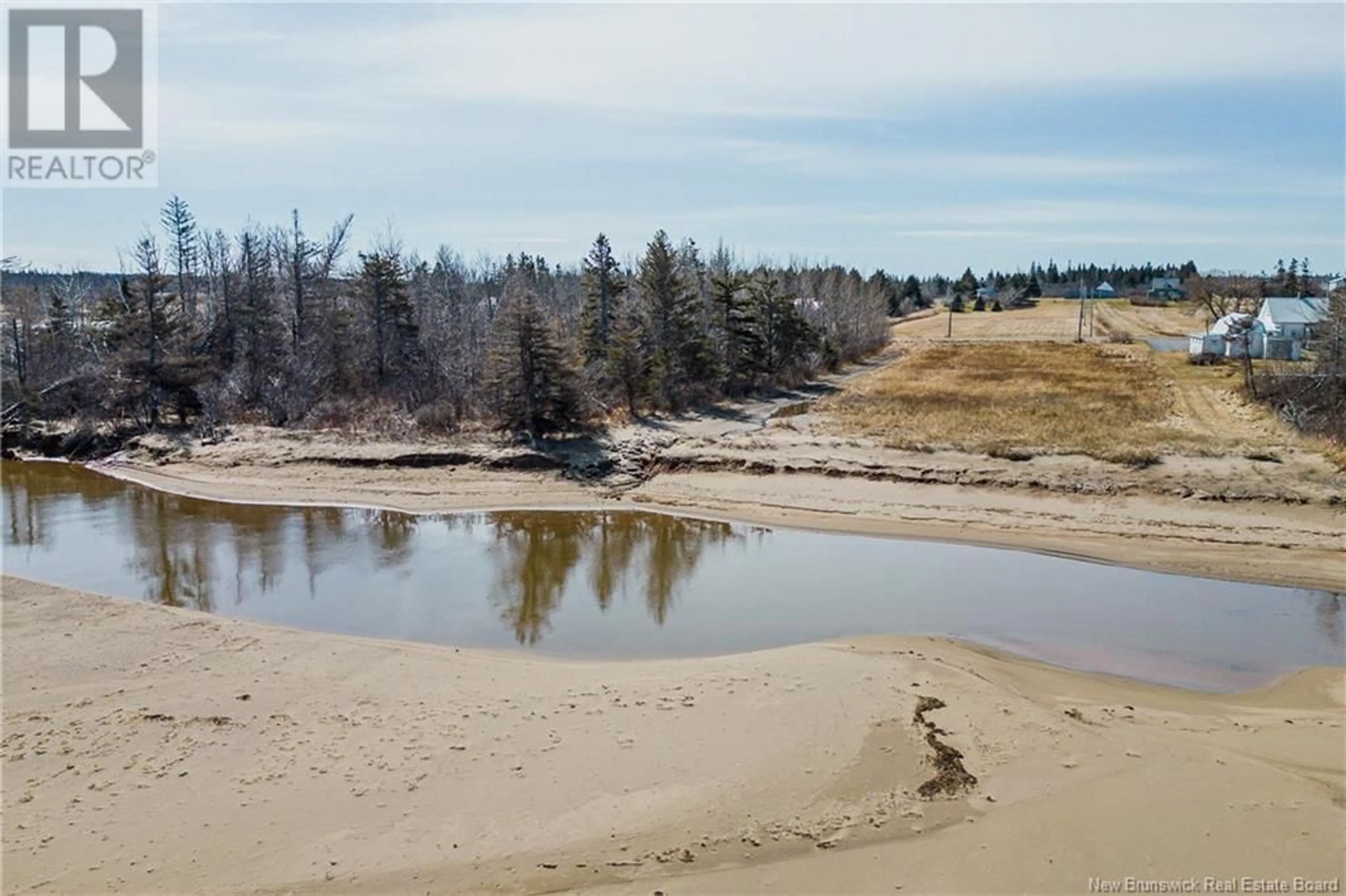 A pic from outside/outdoor area/front of a property/back of a property/a pic from drone, water/lake/river/ocean view for 30 BUDD ROAD, Little Shemogue New Brunswick E4M2Y8