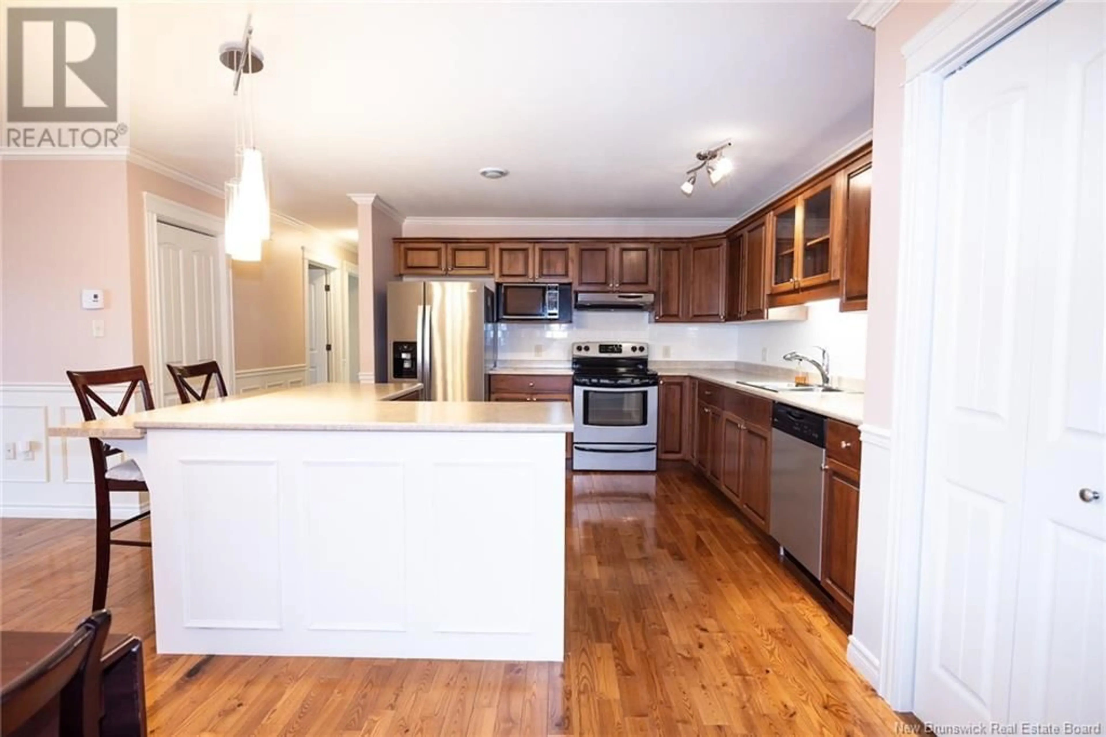 Open concept kitchen, wood/laminate floor for 212 - 160 VALCOUR, Fredericton New Brunswick E3C0C9
