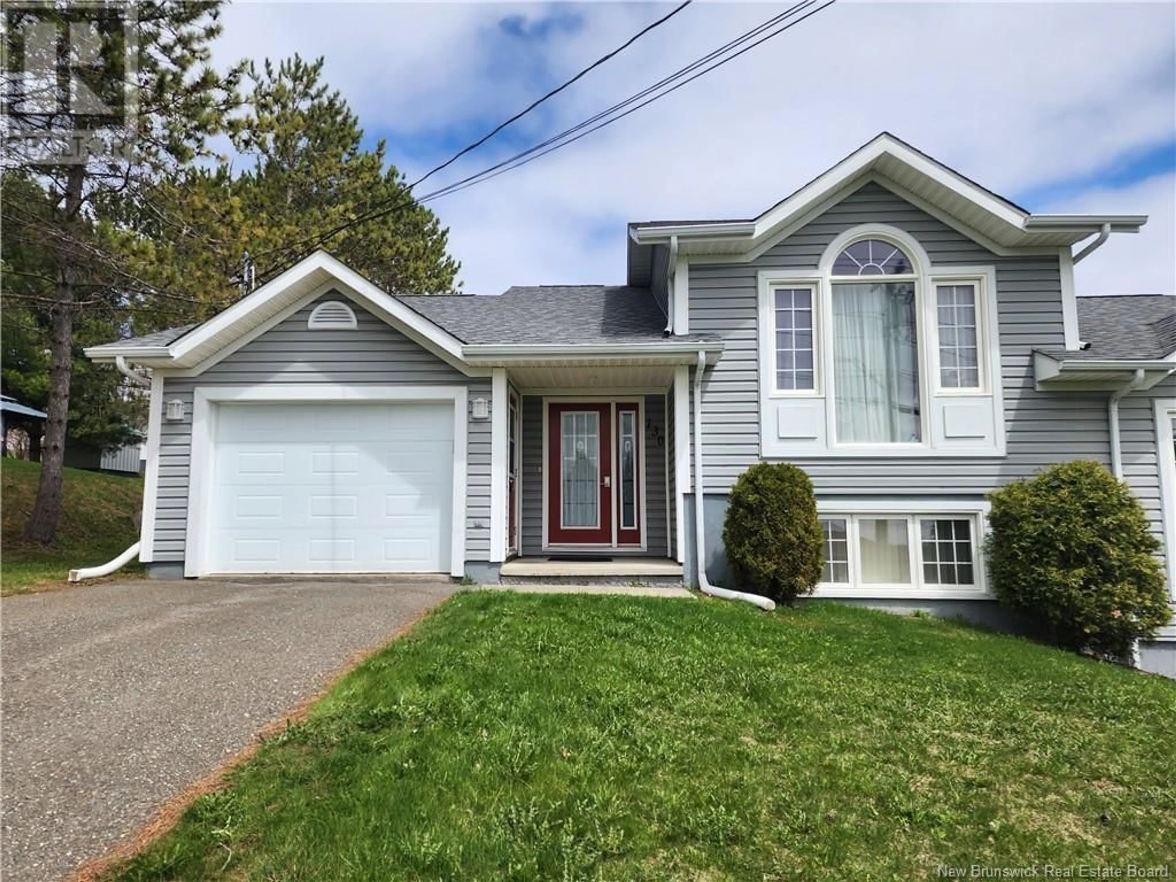 Home with vinyl exterior material, street for 130 HENNIGAR STREET, Grand-Sault/Grand Falls New Brunswick E3Y1B3