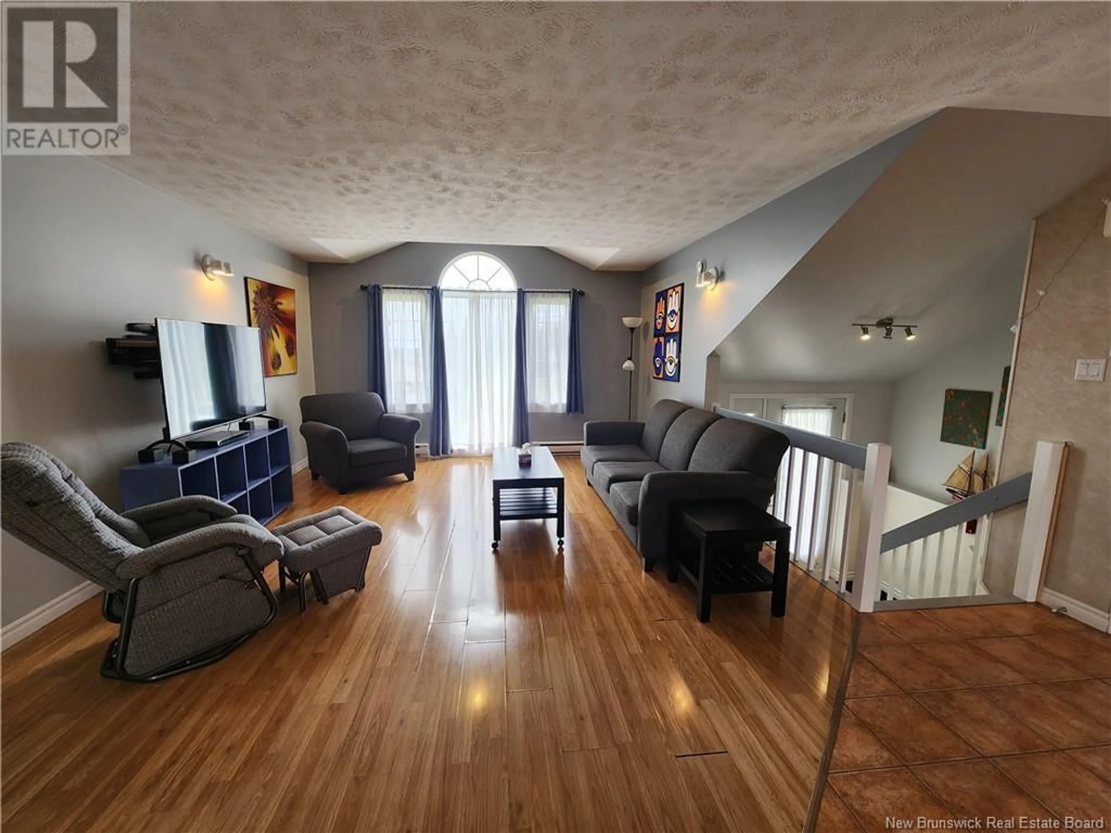 Living room with furniture, wood/laminate floor for 130 HENNIGAR STREET, Grand-Sault/Grand Falls New Brunswick E3Y1B3