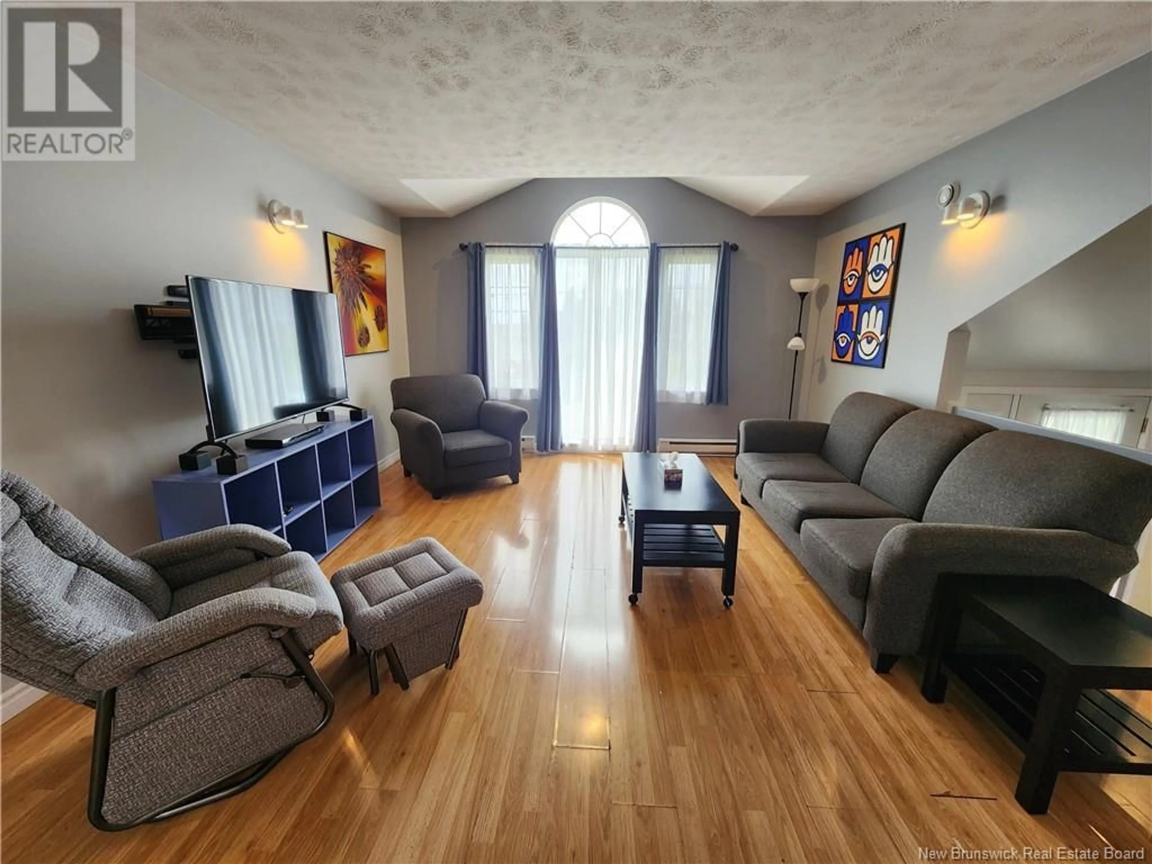 Living room with furniture, wood/laminate floor for 130 HENNIGAR STREET, Grand-Sault/Grand Falls New Brunswick E3Y1B3