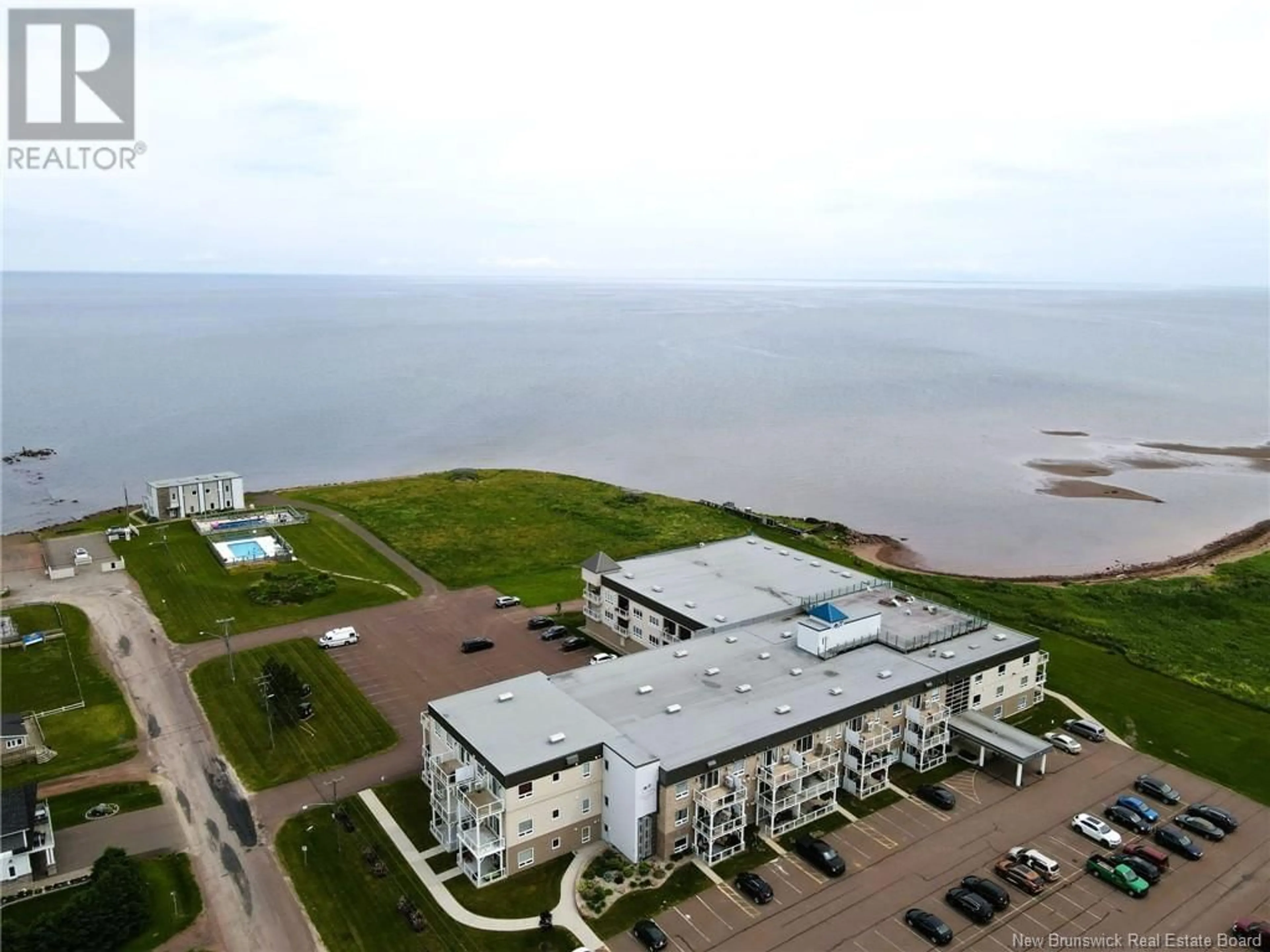 A pic from outside/outdoor area/front of a property/back of a property/a pic from drone, water/lake/river/ocean view for 118 - 69 CAP BIMET, Grand-Barachois New Brunswick E4P6X5