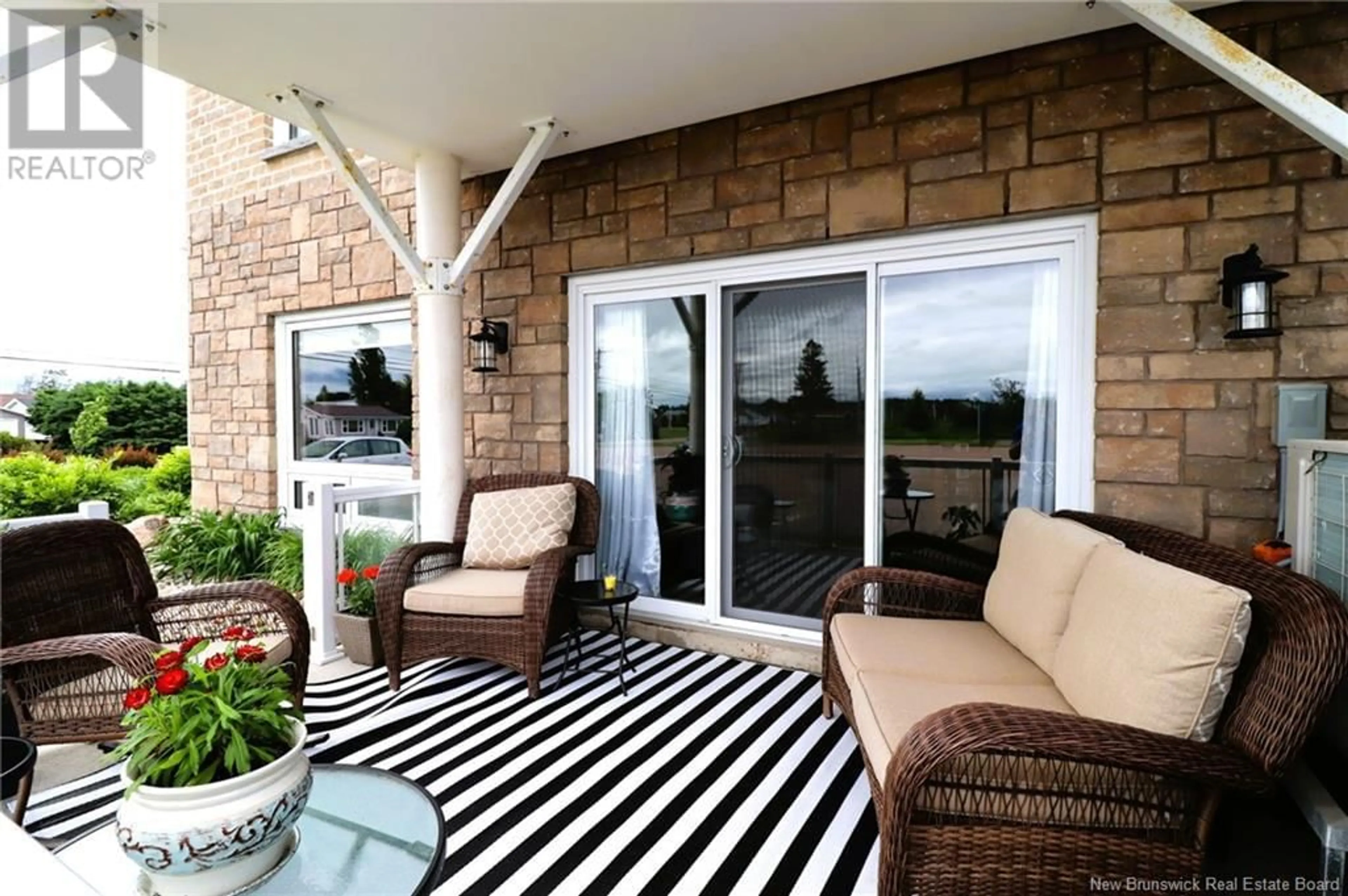 Patio, water/lake/river/ocean view for 118 - 69 CAP BIMET, Grand-Barachois New Brunswick E4P6X5