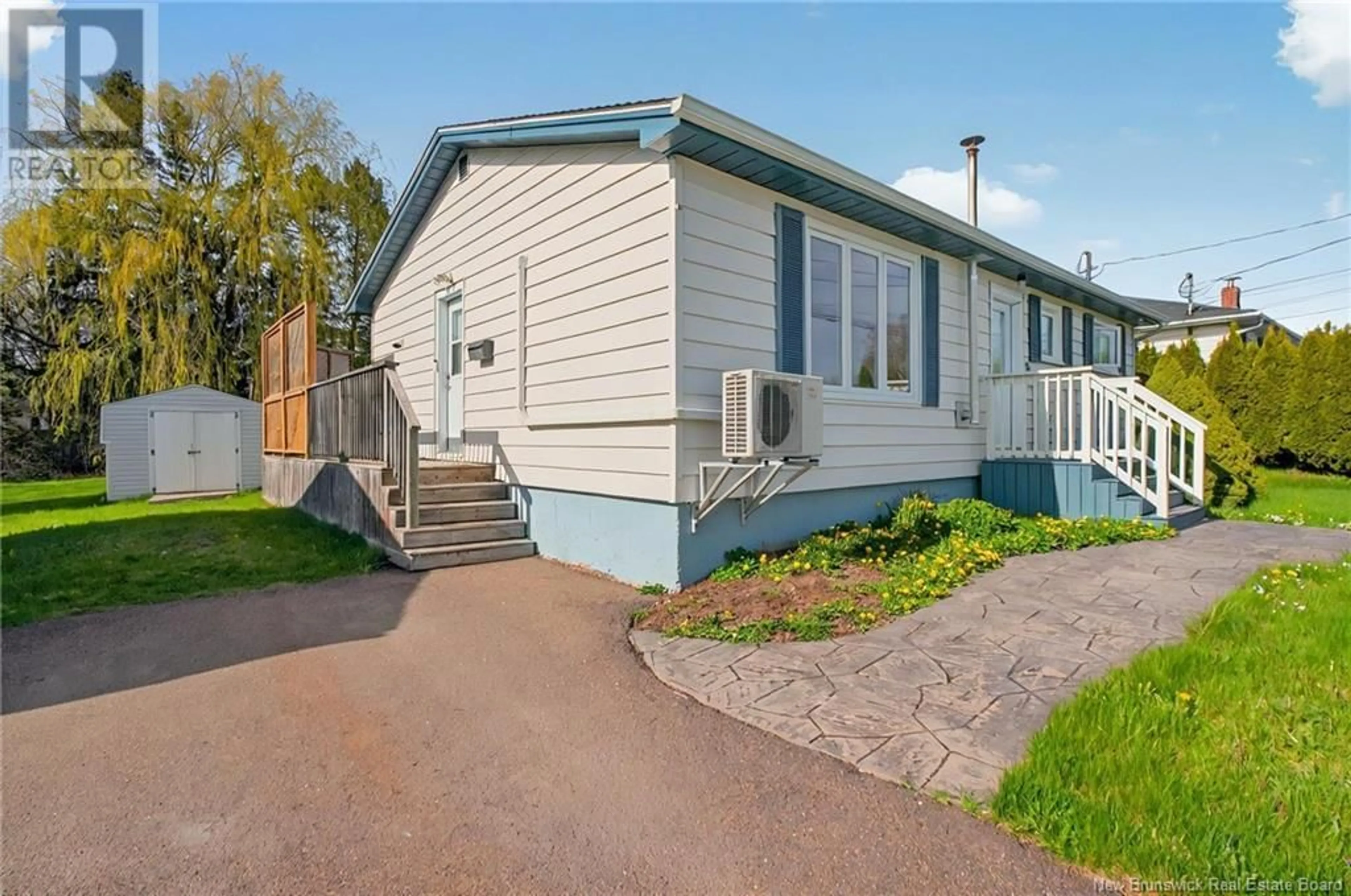 Home with vinyl exterior material, street for 15 GREENHILL DRIVE, Moncton New Brunswick E1A2L6