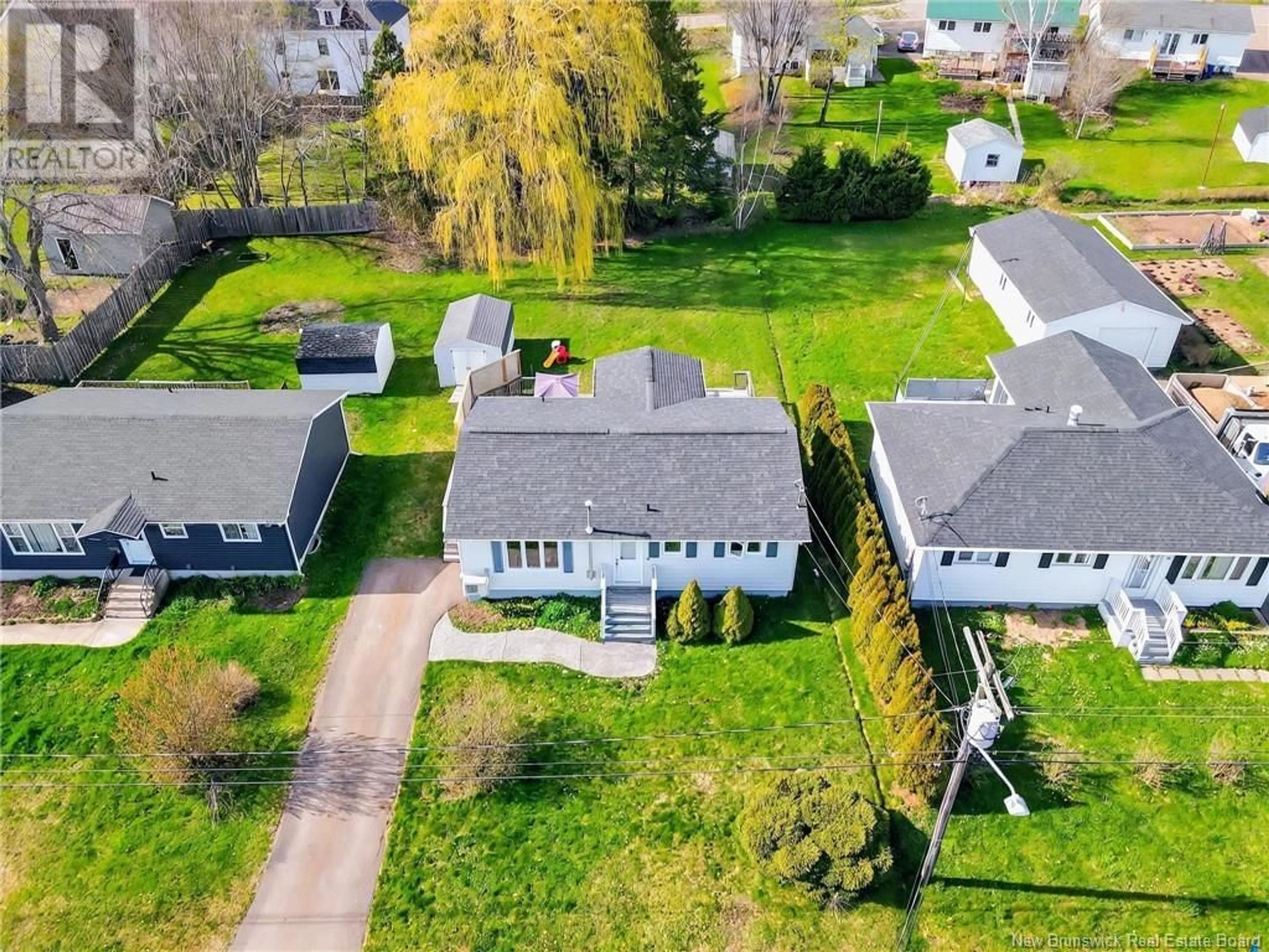 A pic from outside/outdoor area/front of a property/back of a property/a pic from drone, street for 15 GREENHILL DRIVE, Moncton New Brunswick E1A2L6