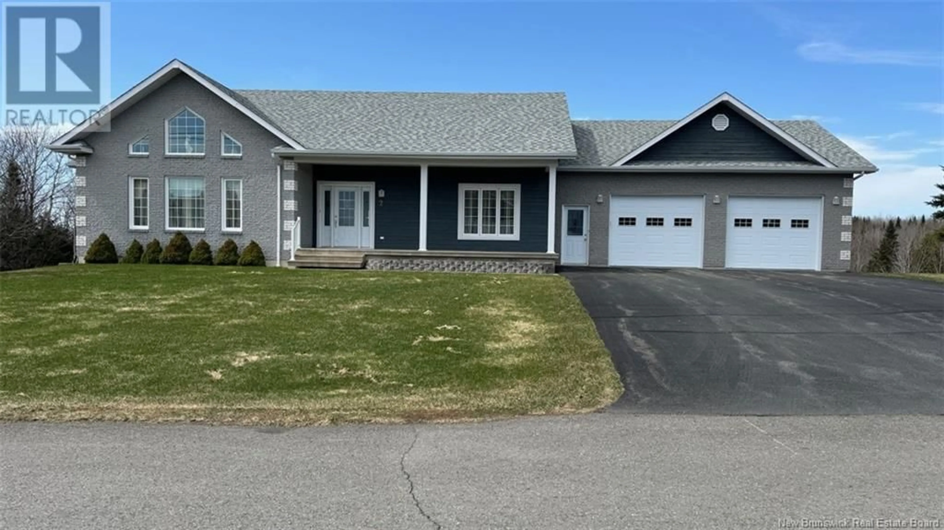 Home with vinyl exterior material, street for 2 ROLAND J. MARTIN STREET, Saint-Léonard New Brunswick E7E2V2