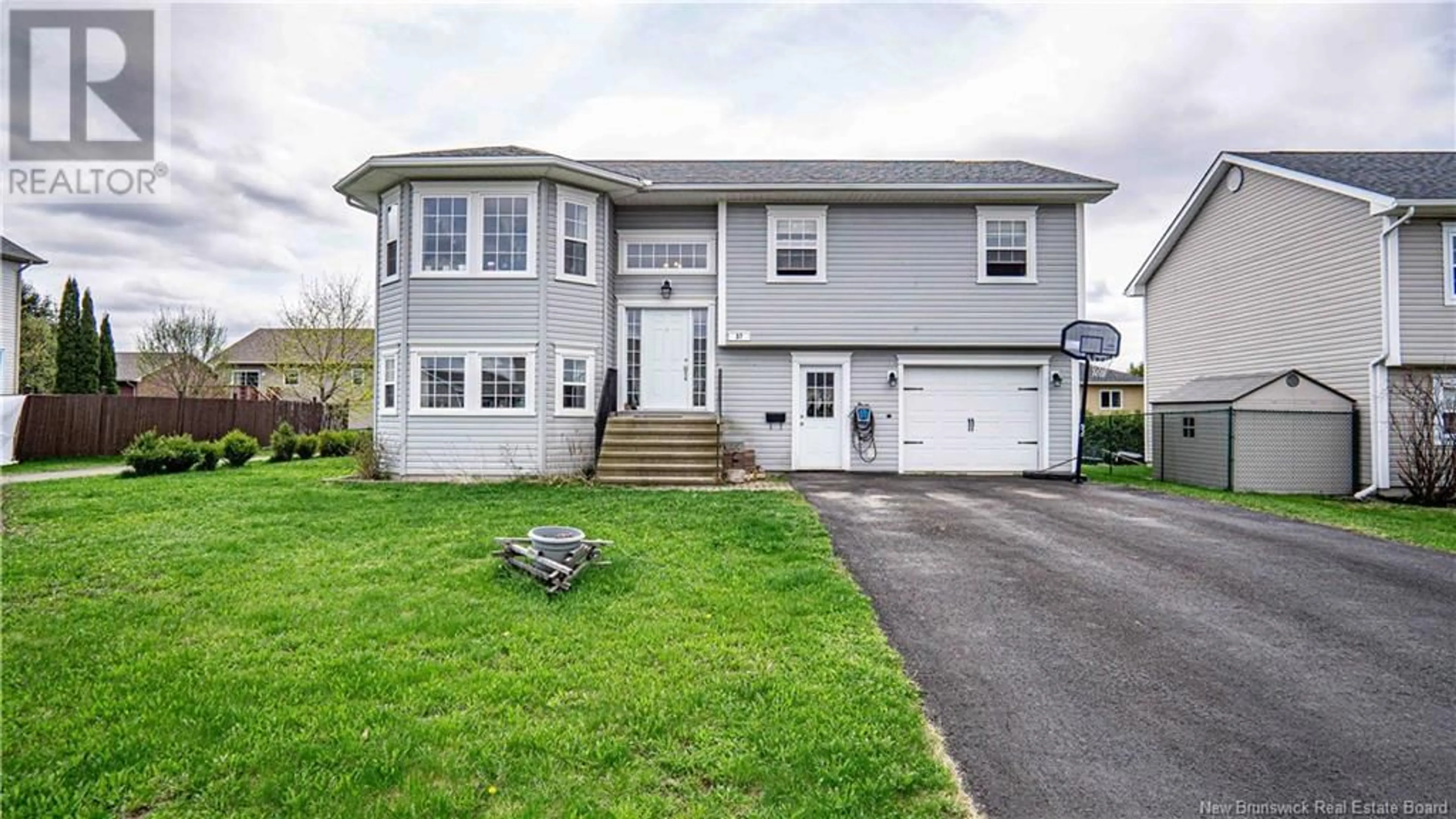Home with vinyl exterior material, street for 37 DAWSON DRIVE, Oromocto New Brunswick E2V4S9